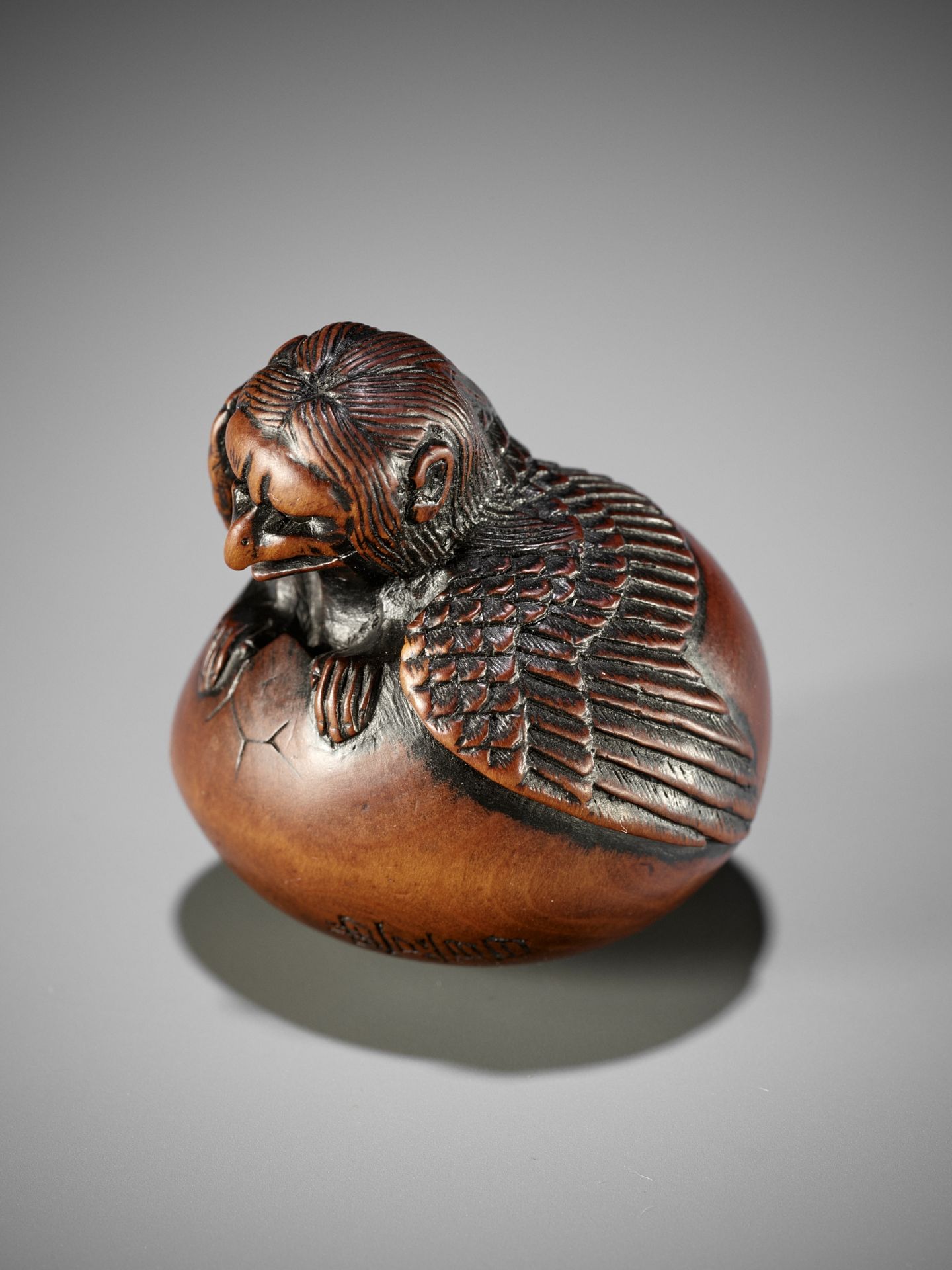 NAITO TOYOMASA: A FINE WOOD NETSUKE OF A HATCHING TENGU (TENGU NO TOMAGO) - Image 3 of 17