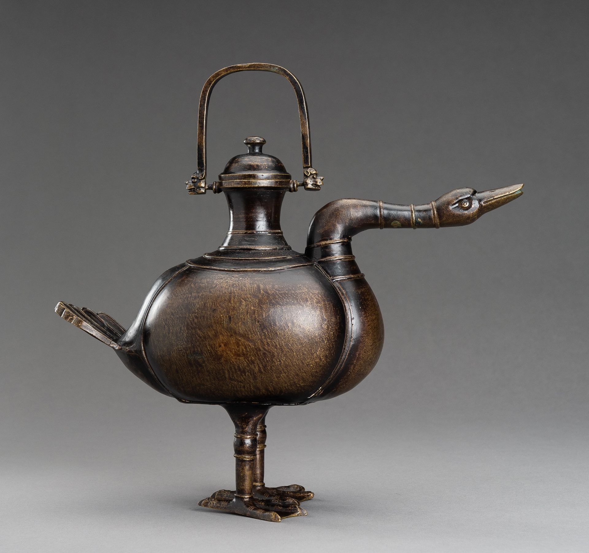 A LARGE 'SWAN' BRONZE EWER