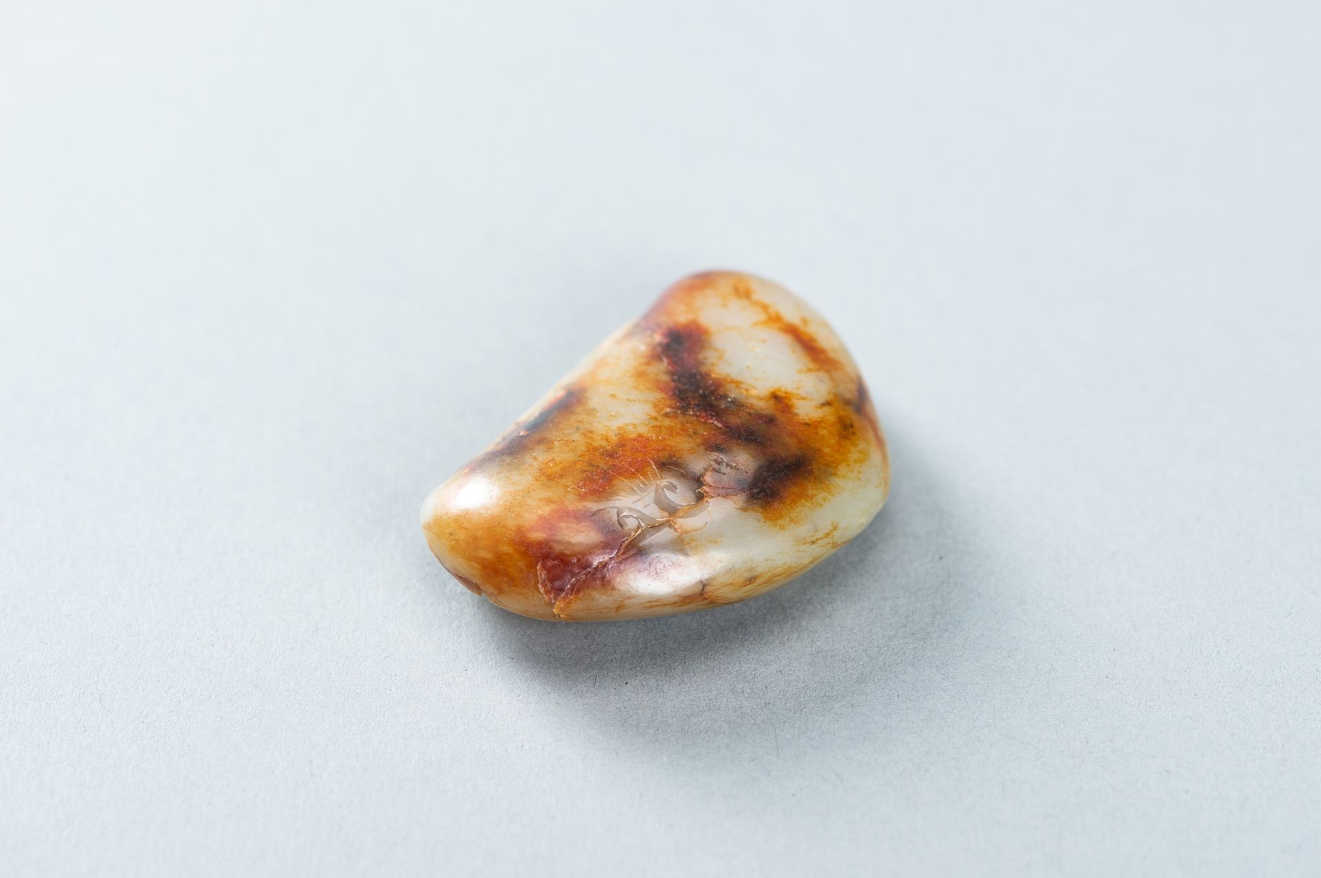 A CELADON AND RUSSET JADE 'FISH AND CRANE' PENDANT, c. 1920s - Image 6 of 9