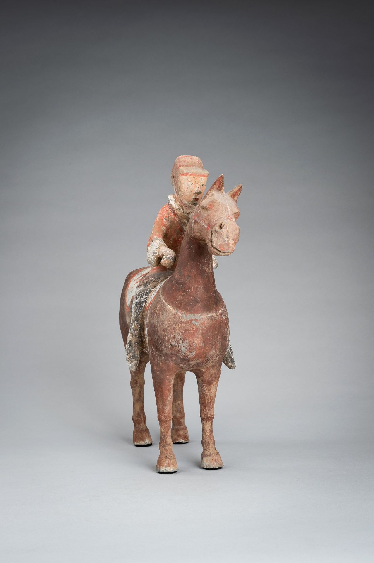 A POTTERY FIGURE OF AN EQUESTRIAN, HAN DYNASTY - Bild 11 aus 13