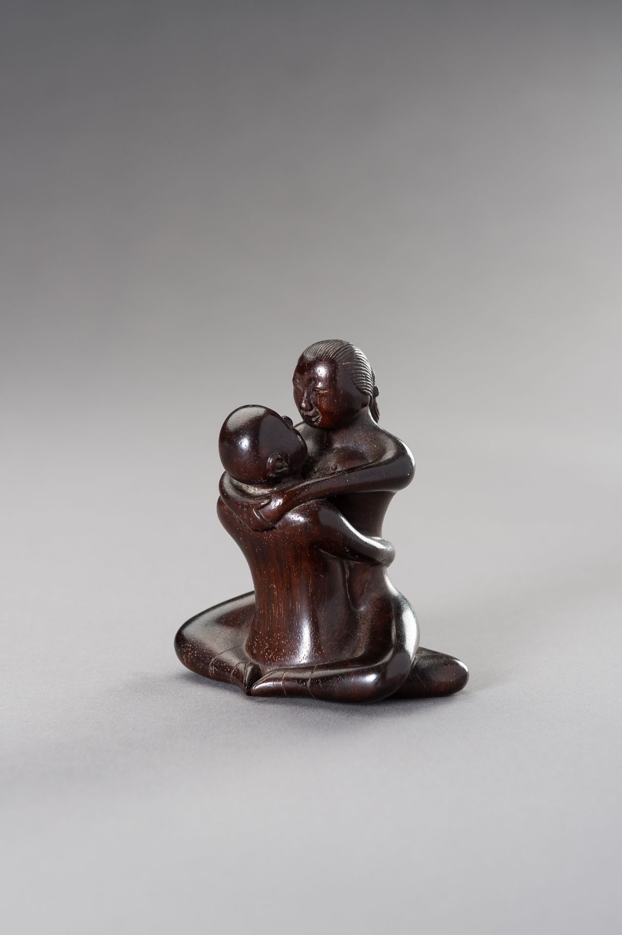 A ZITAN WOOD FIGURE OF A COUPLE IN EROTIC EMBRACE - Image 6 of 12