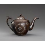 A SILVER AND COPPER TEAPOT, 1900s