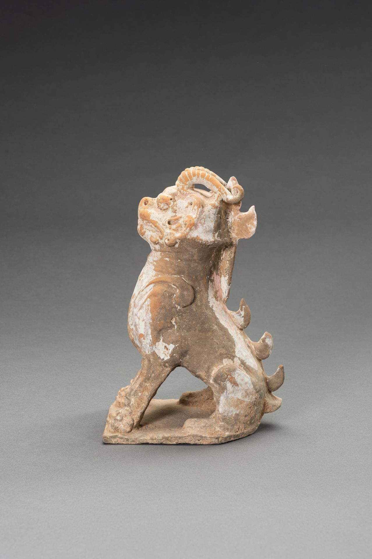 A POTTERY FIGURE OF A HORNED GUARDIAN BEAST, TANG DYNASTY OR EARLIER - Image 6 of 13