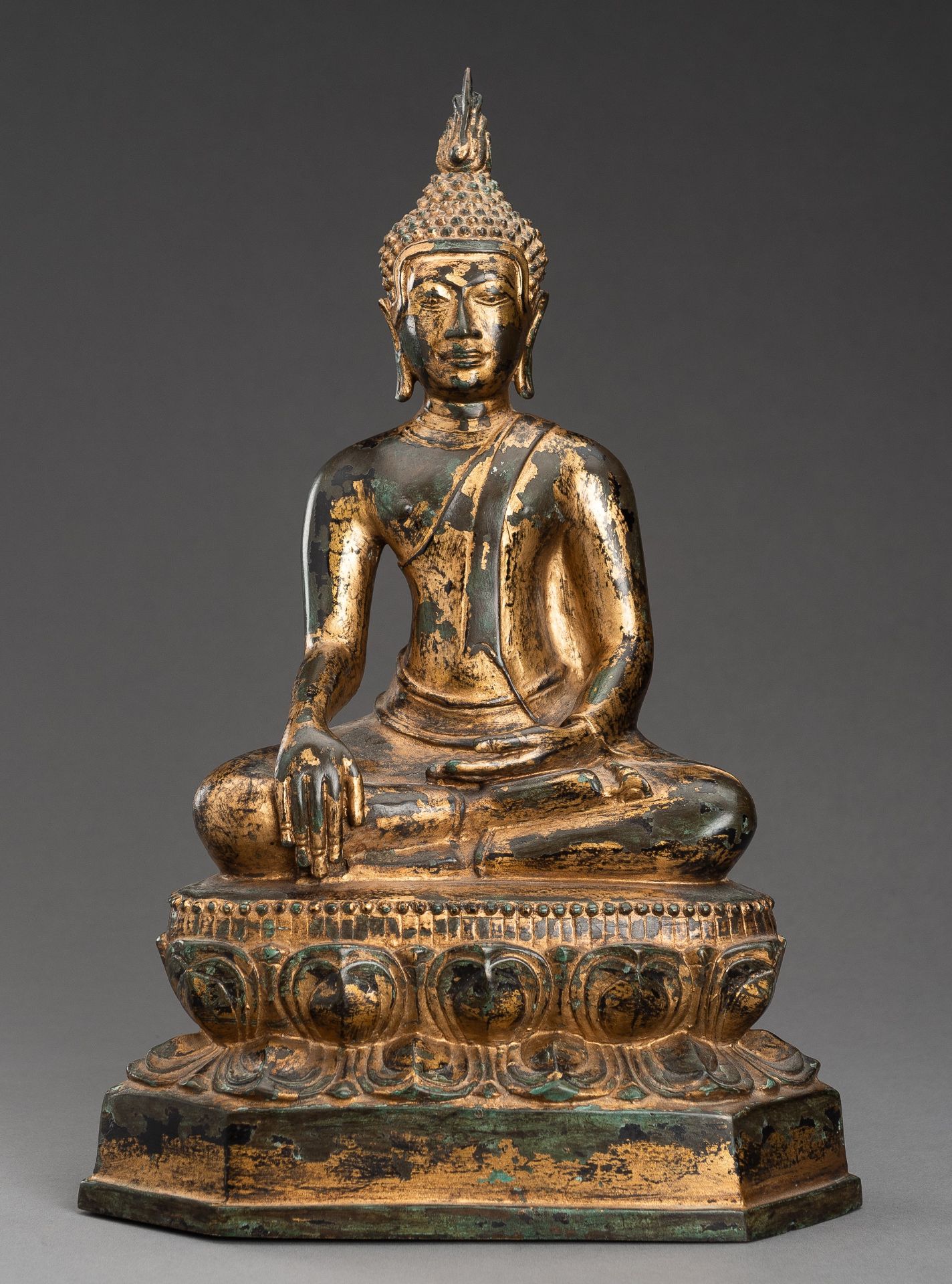 A LARGE GOLD LACQUERED BRONZE FIGURE OF BUDDHA