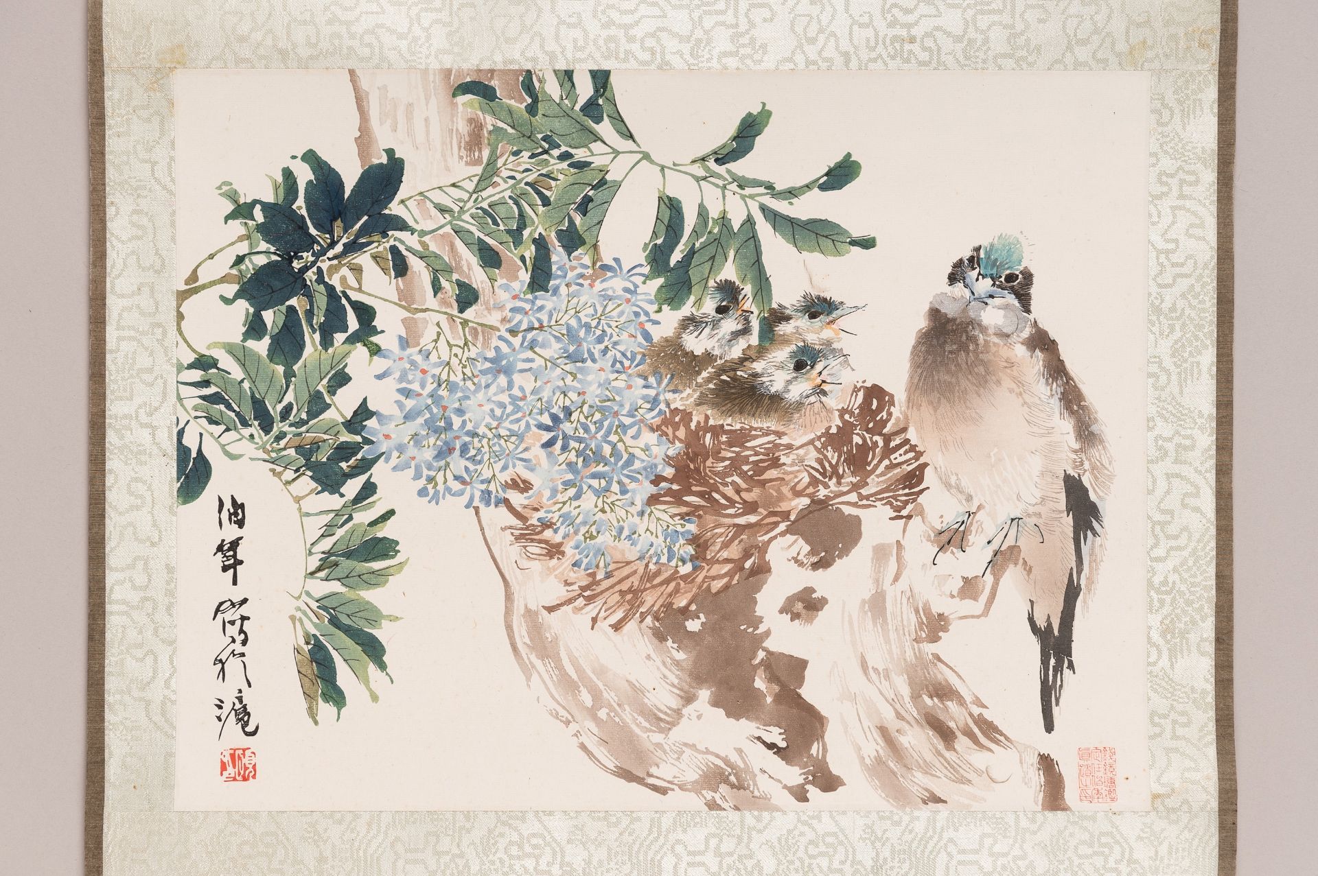 A SCROLL WITH PRINT AFTER REN YI 'BIRD WITH YOUNG'