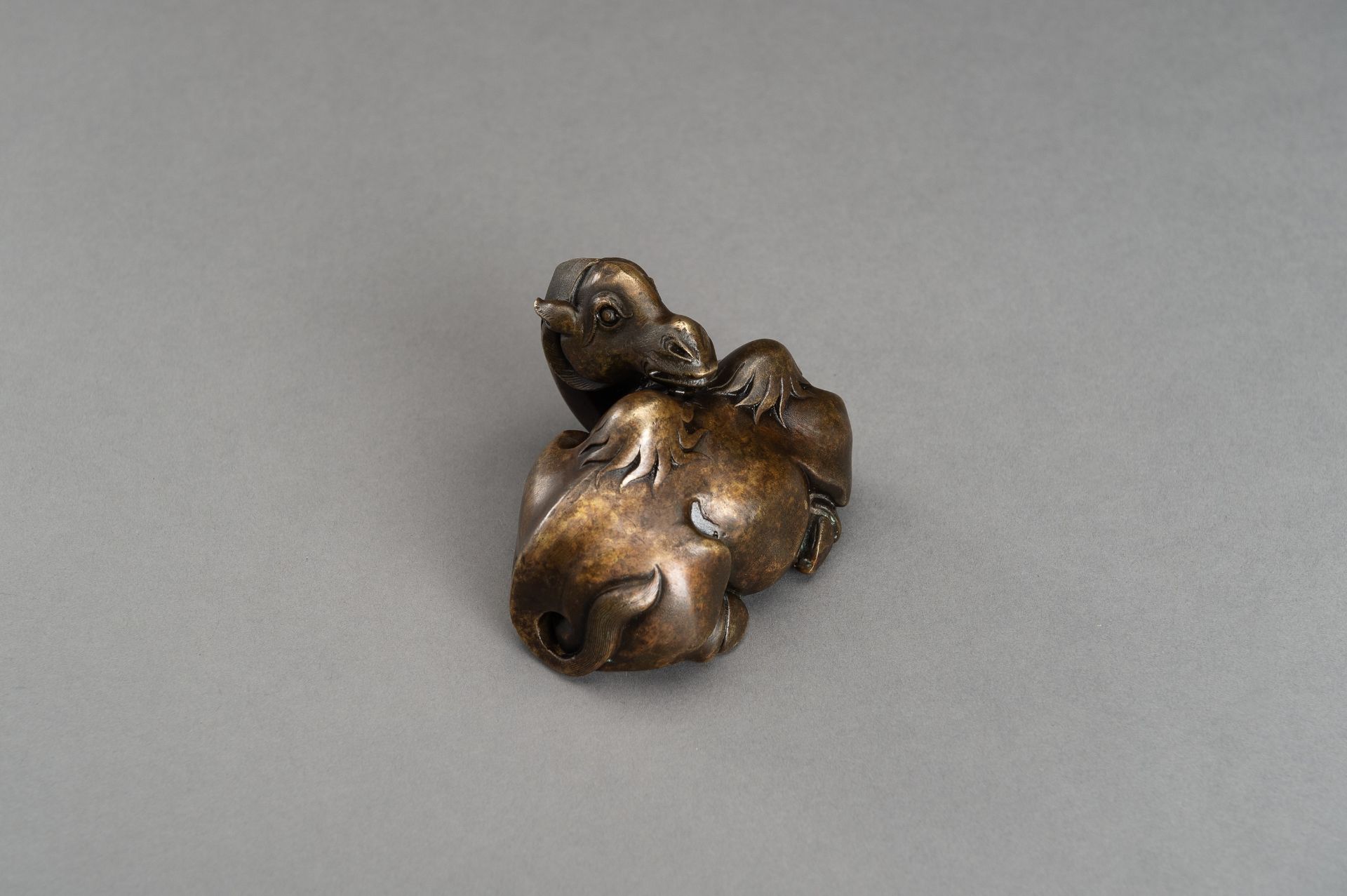 A BRONZE SCROLL WEIGHT OF A BACTRIAN CAMEL, QING - Image 9 of 12