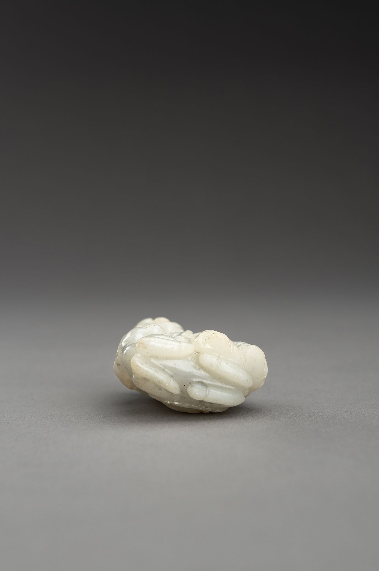 A WHITE JADE GROUP OF A LUOHAN AND DEER - Image 10 of 10