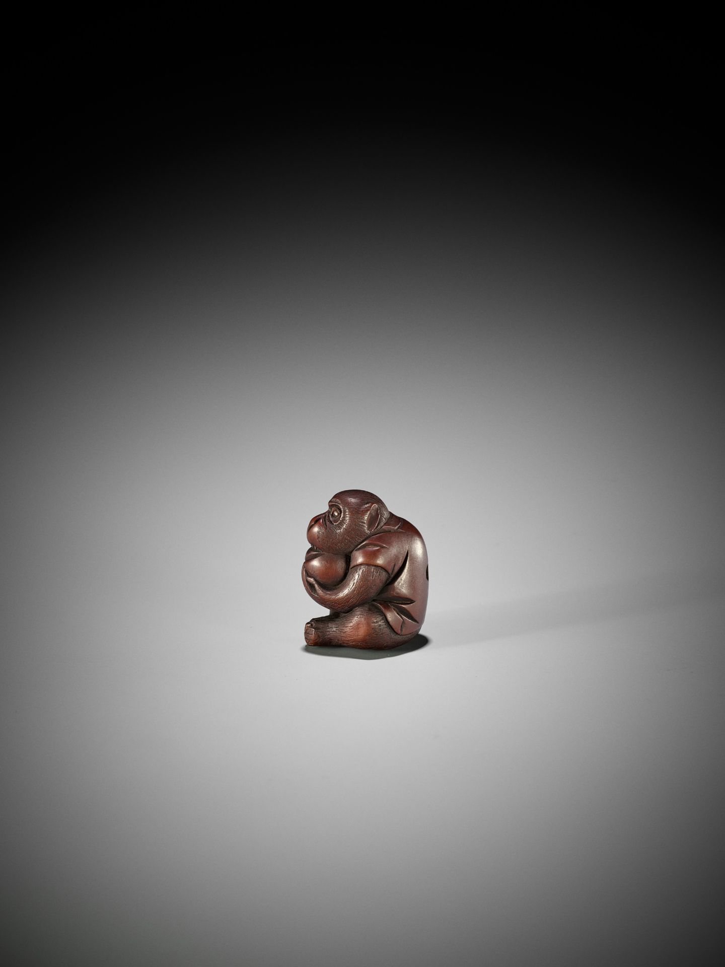 MASAKAZU: A WOOD NETSUKE OF A MONKEY WITH PEACH, SCHOOL OF TOMOKAZU - Image 6 of 10