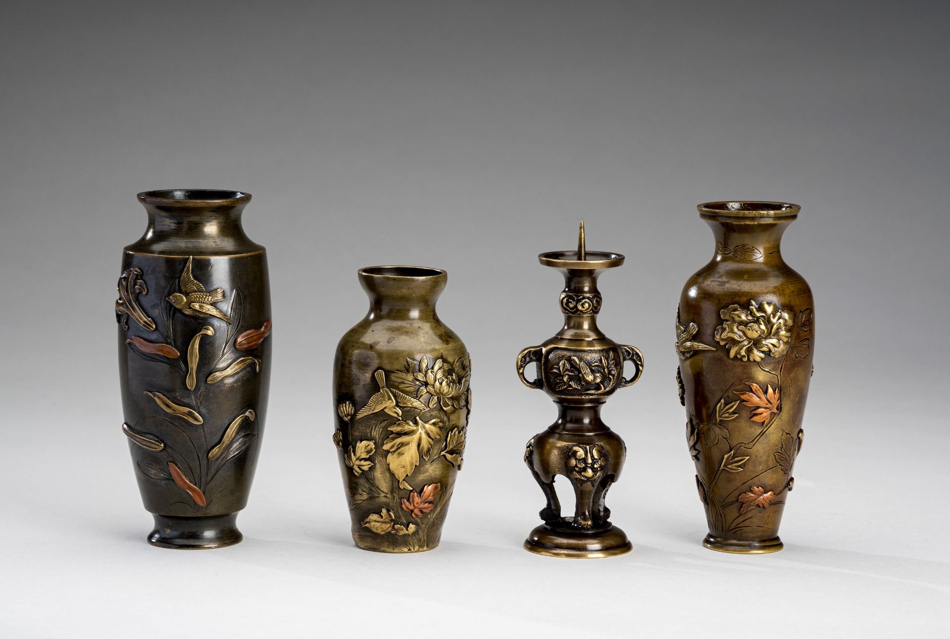 A LOT WITH THREE MIXED METAL VASES AND A CANDLESTICK, MEIJI