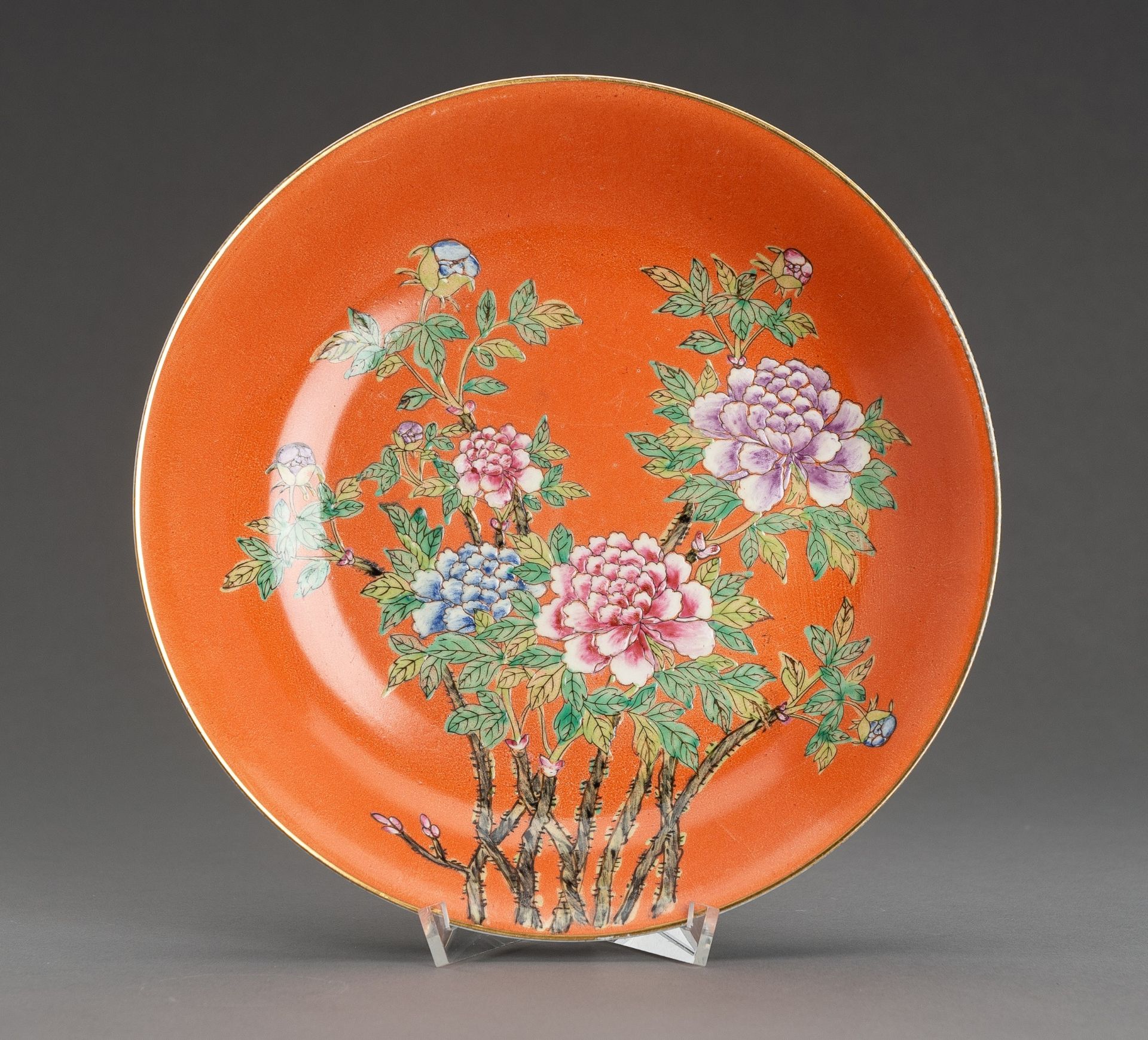 A CORAL RED GLAZED 'PEONIES' PORCELAIN DISH