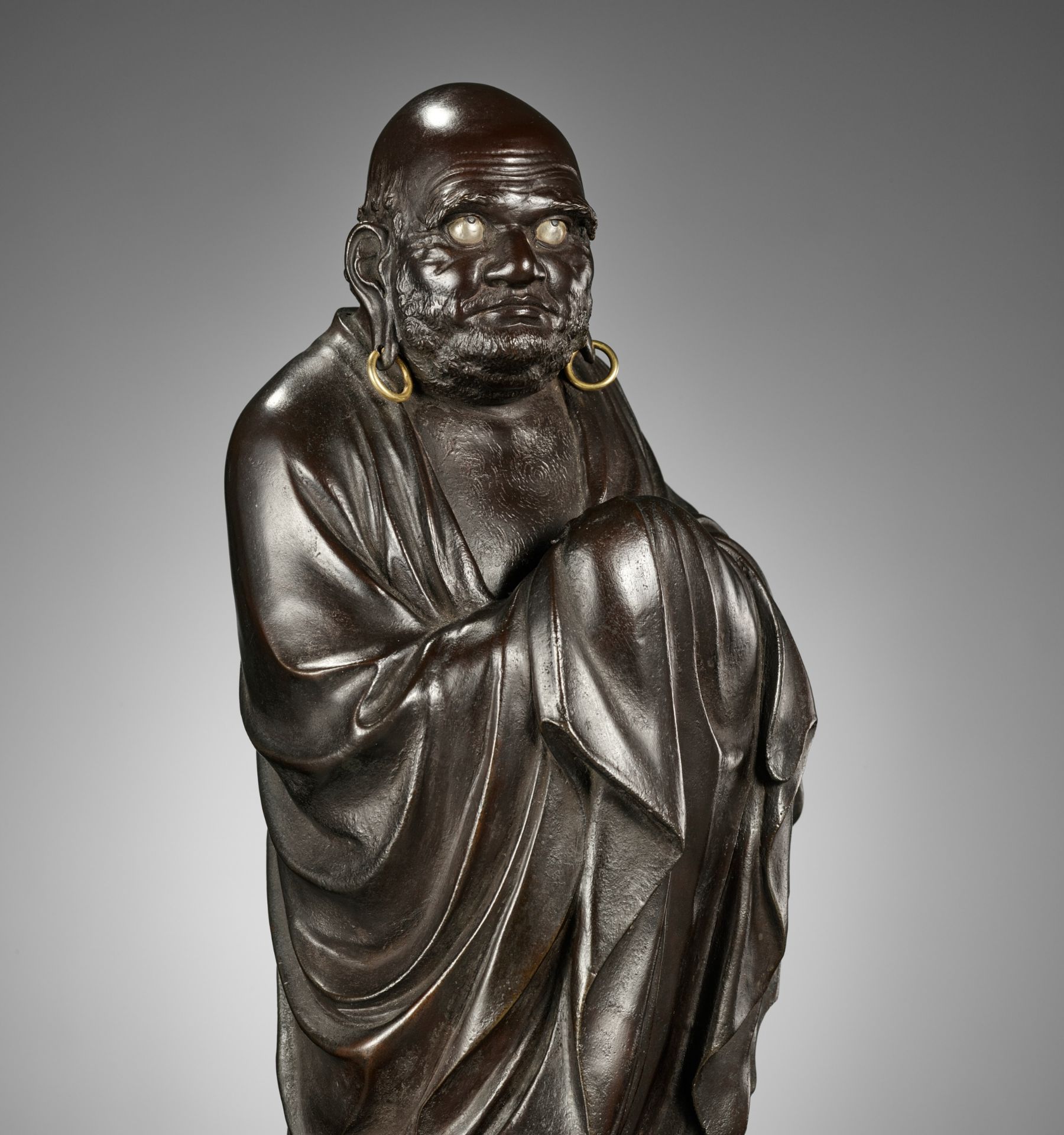 JOUN: A SUPERB BRONZE PORTRAIT OKIMONO OF DARUMA