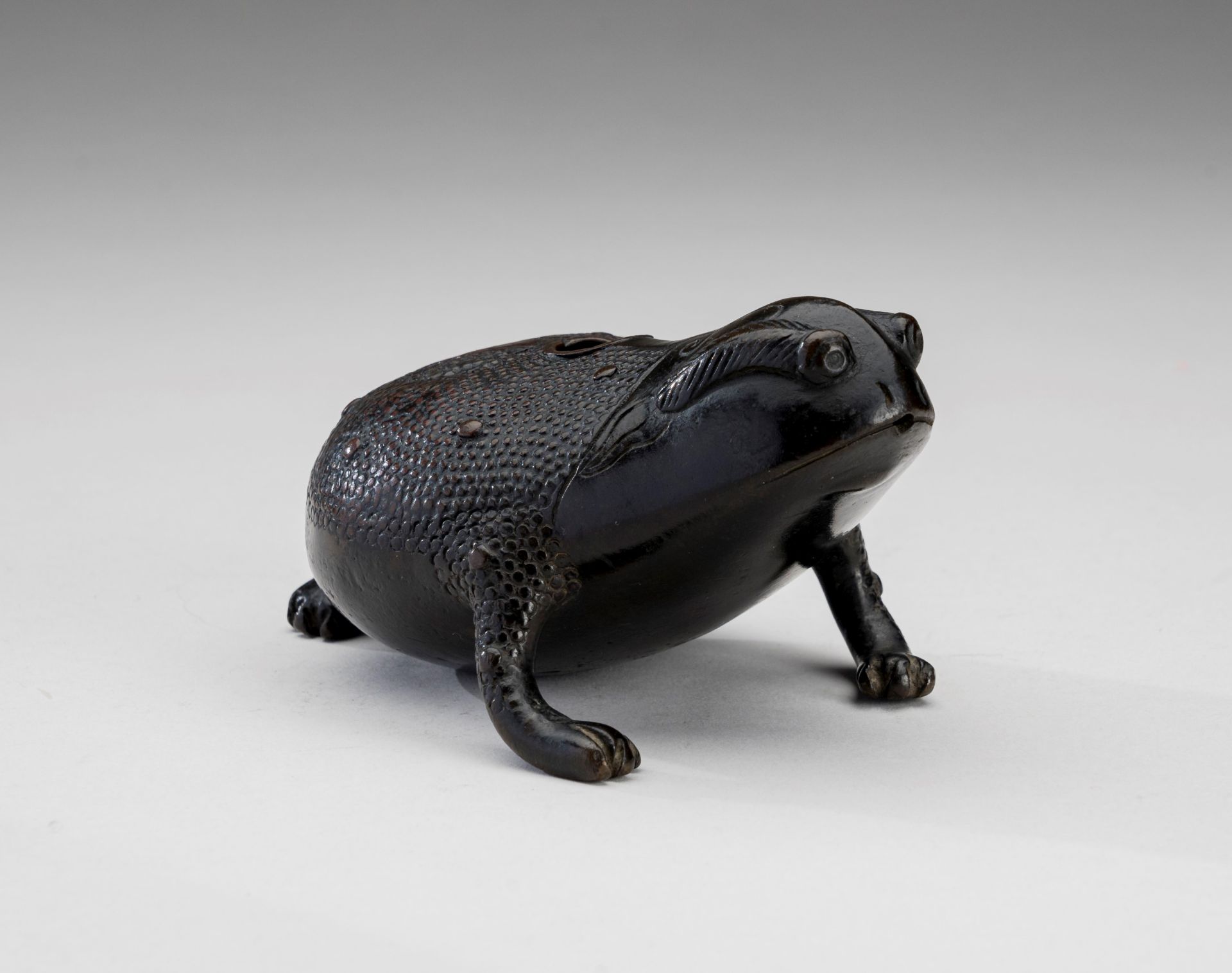 A BRONZE WATER DROPPER IN THE SHAPE OF GAMA SENNIN'S TOAD