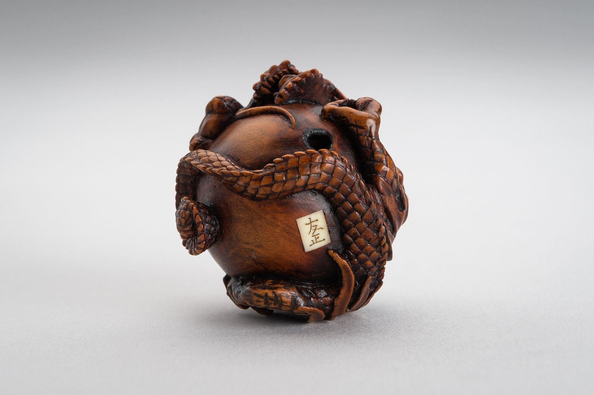 TOMOMASA: A BOXWOOD NETSUKE OF A COILED DRAGON - Image 15 of 15