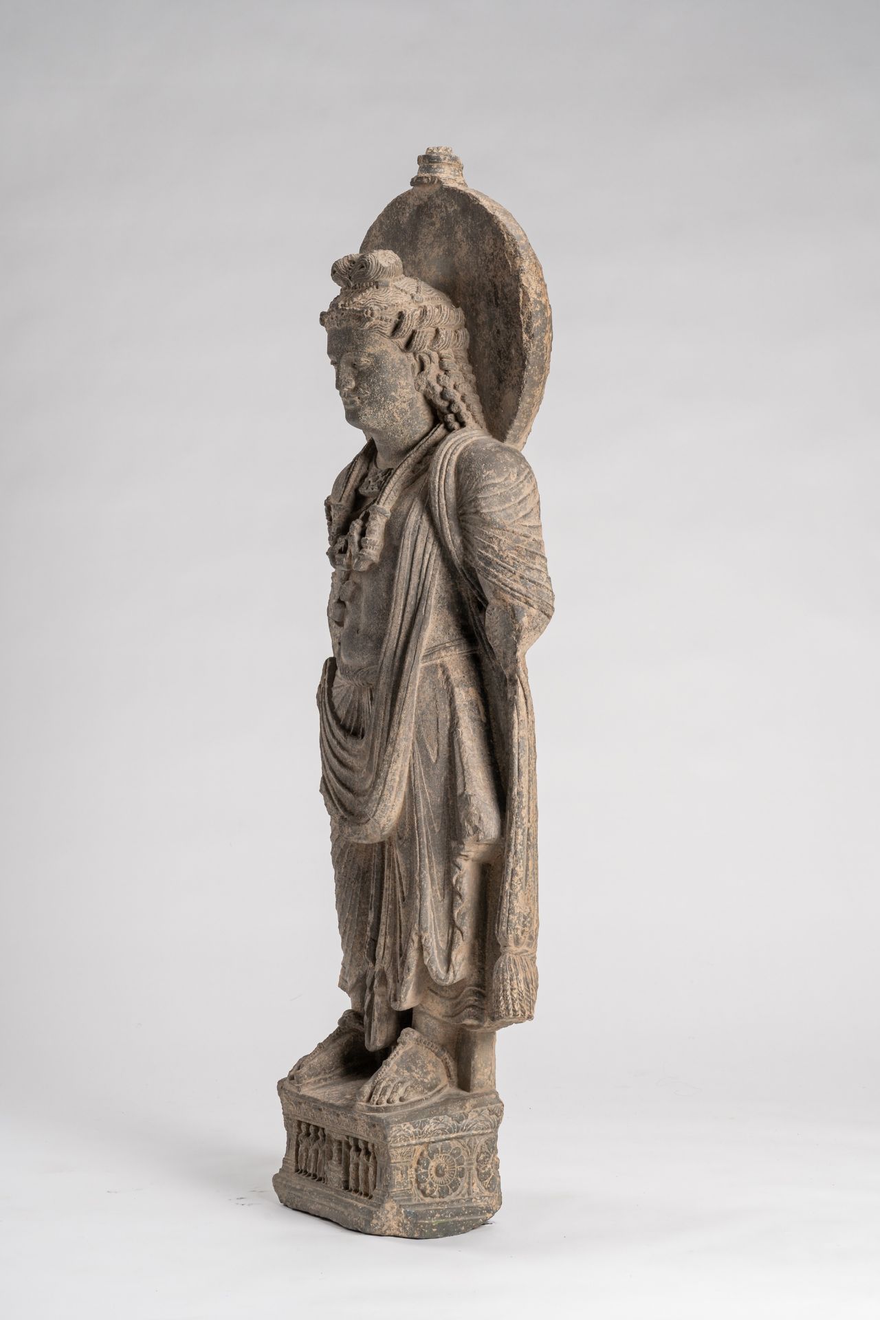 A GANDHARA-STYLE GRAY SCHIST FIGURE OF MAITREYA - Image 5 of 8