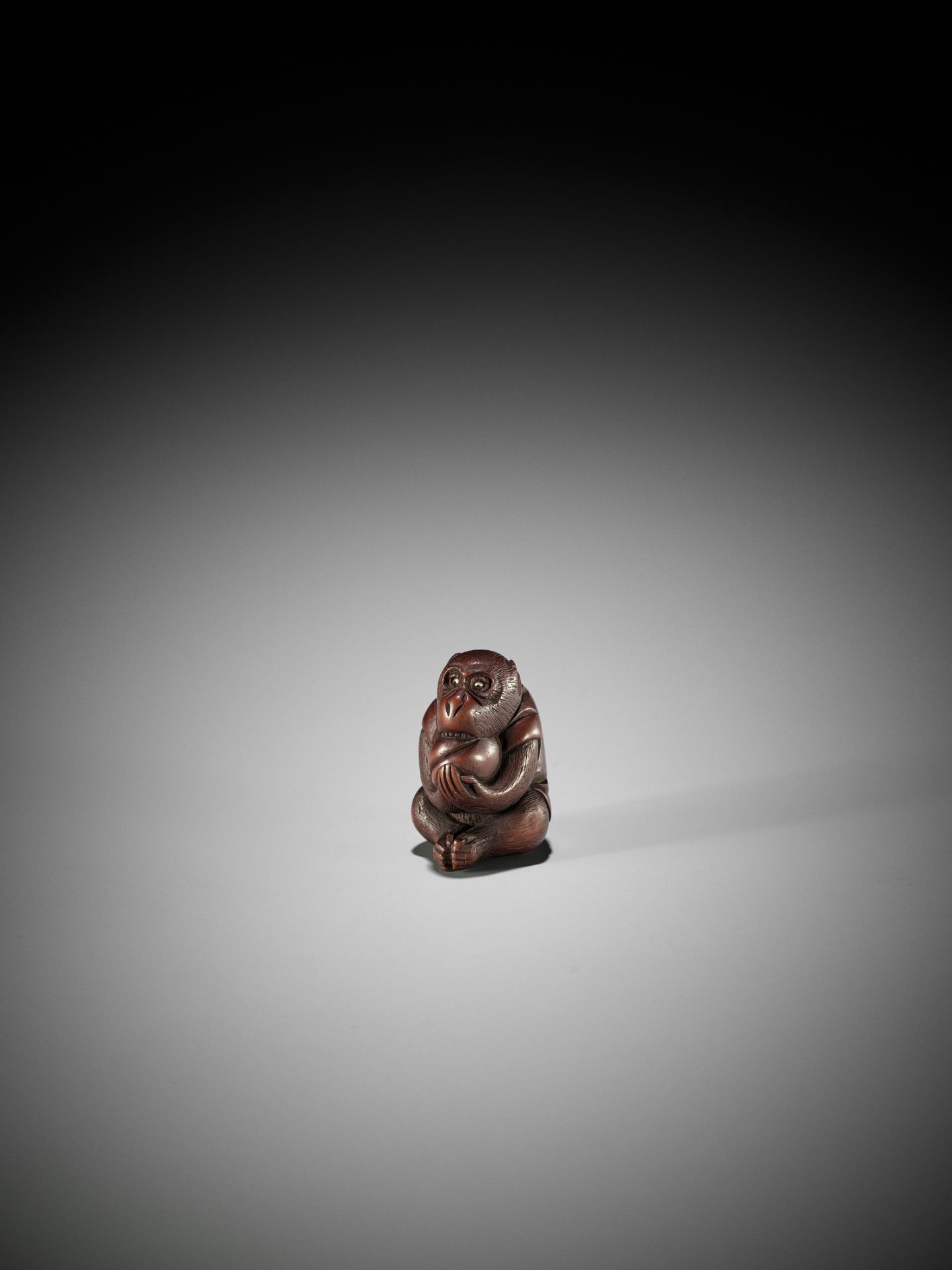 MASAKAZU: A WOOD NETSUKE OF A MONKEY WITH PEACH, SCHOOL OF TOMOKAZU - Image 3 of 10