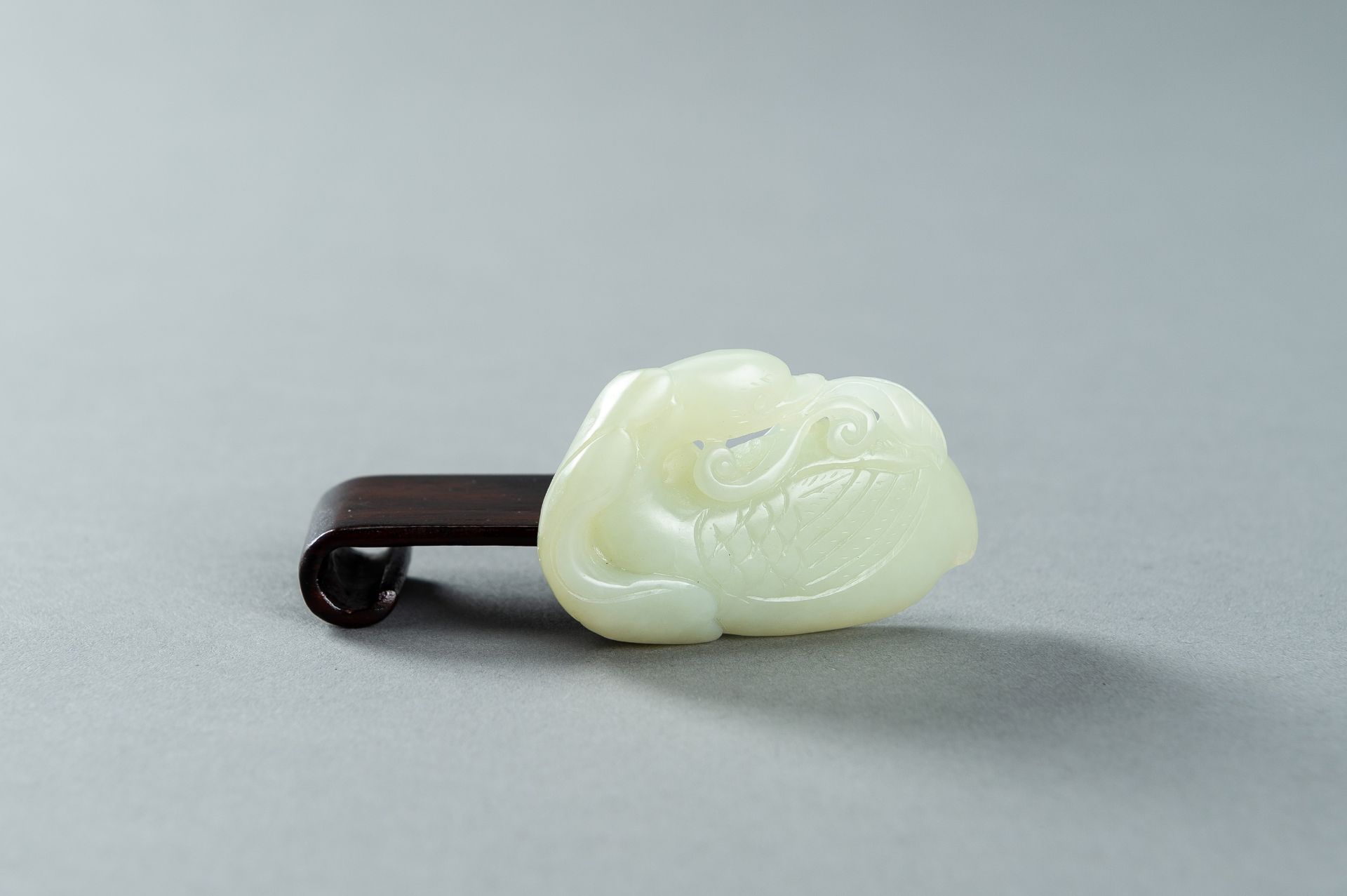 A PALE CELADON JADE CARVING OF A DUCK, 1900s - Image 9 of 13