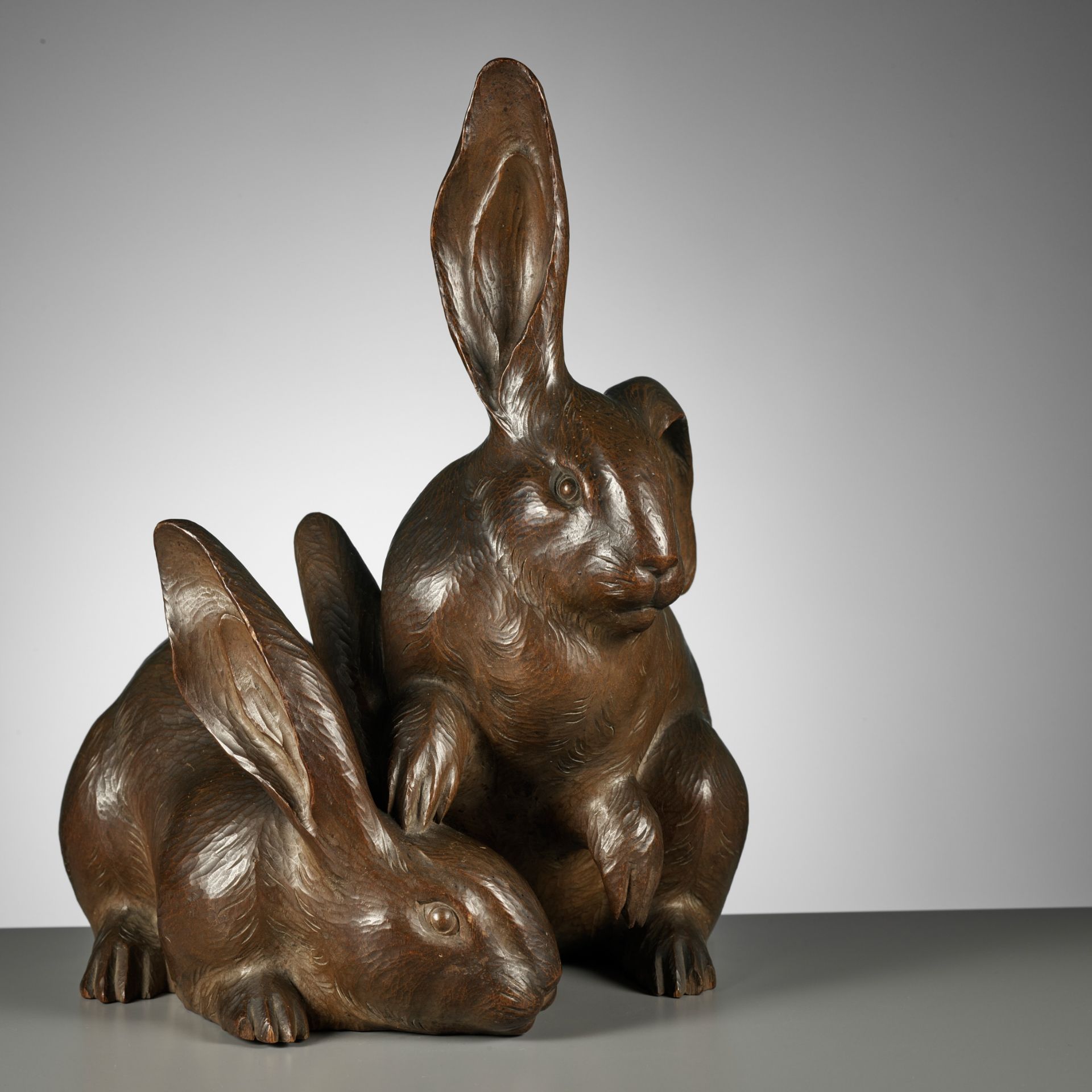 HIROYUKI: A FINE BOXWOOD OKIMONO OF LONG-EARED HARES