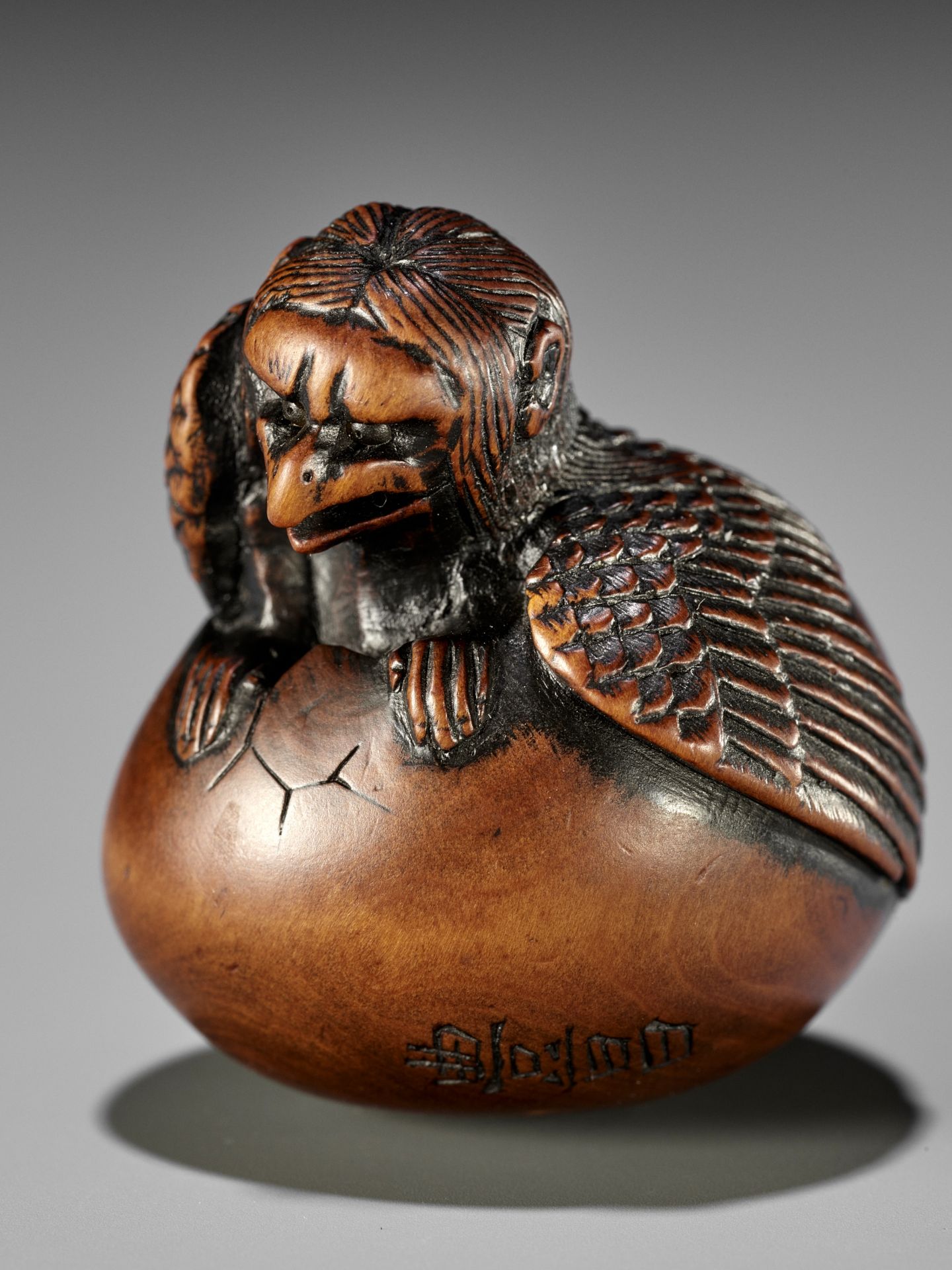 NAITO TOYOMASA: A FINE WOOD NETSUKE OF A HATCHING TENGU (TENGU NO TOMAGO) - Image 4 of 17