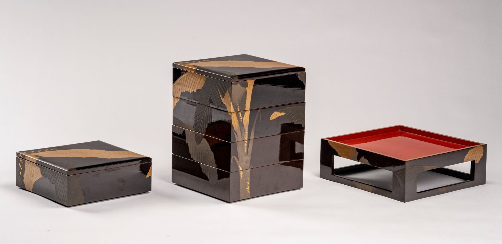 A LACQUERED BENTO BOX SET WITH TRAY