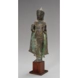 A KHMER BRONZE FIGURE OF A CROWNED BUDDHA, 13TH CENTURY