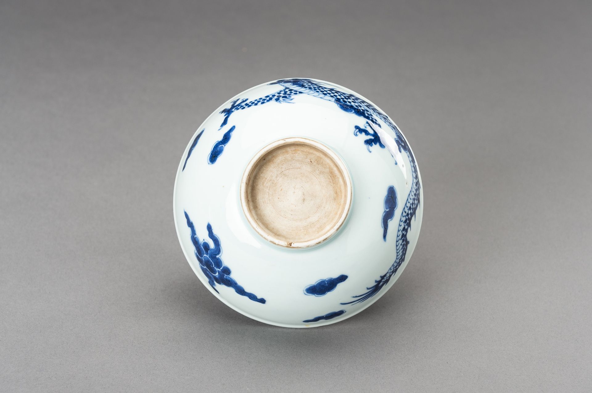 A BLUE AND WHITE 'DRAGON' PORCELAIN BOWL, 1920s - Image 14 of 14