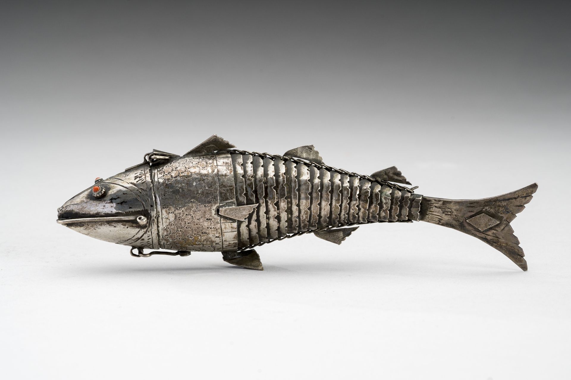 AN ARTICULATED SILVER FISH, c. 1900s