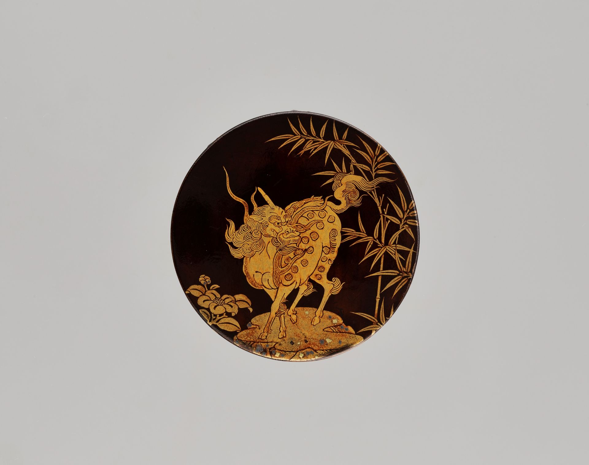 A RARE CIRCULAR LACQUER KOGO (INCENSE CONTAINER) WITH KIRIN