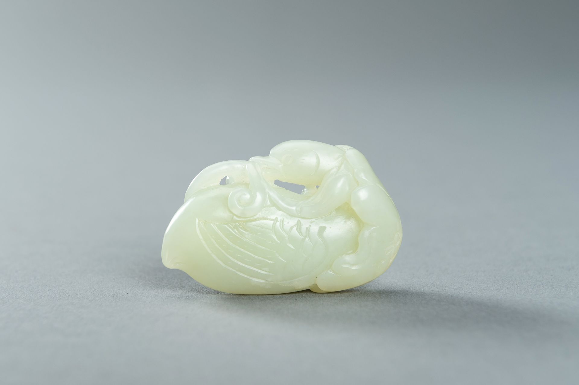 A PALE CELADON JADE CARVING OF A DUCK, 1900s - Image 11 of 13