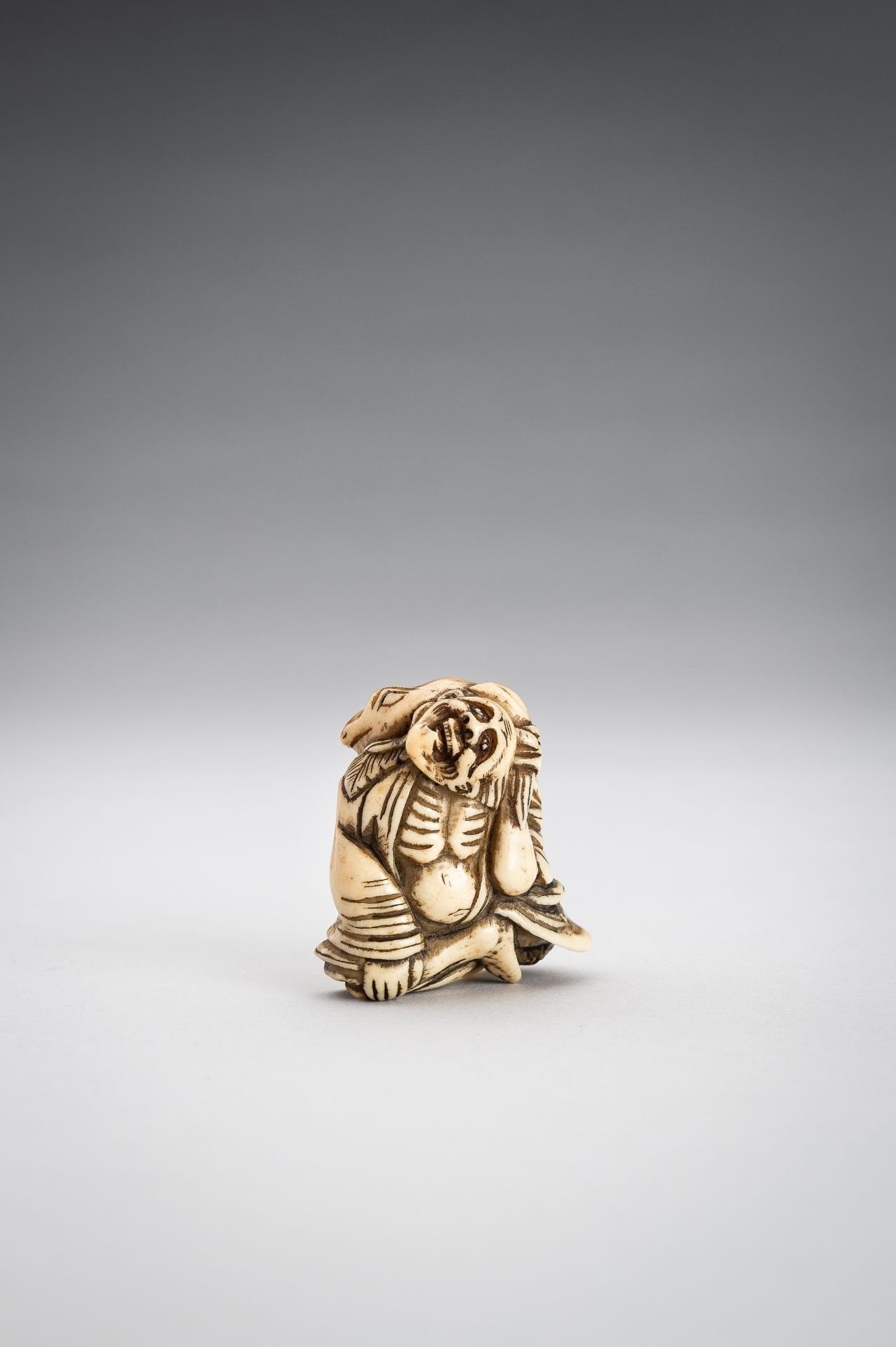 A STAG ANTLER NETSUKE OF GAMA SENNIN - Image 2 of 9