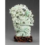 A JADEITE CARVING OF A FLOWER BASKET