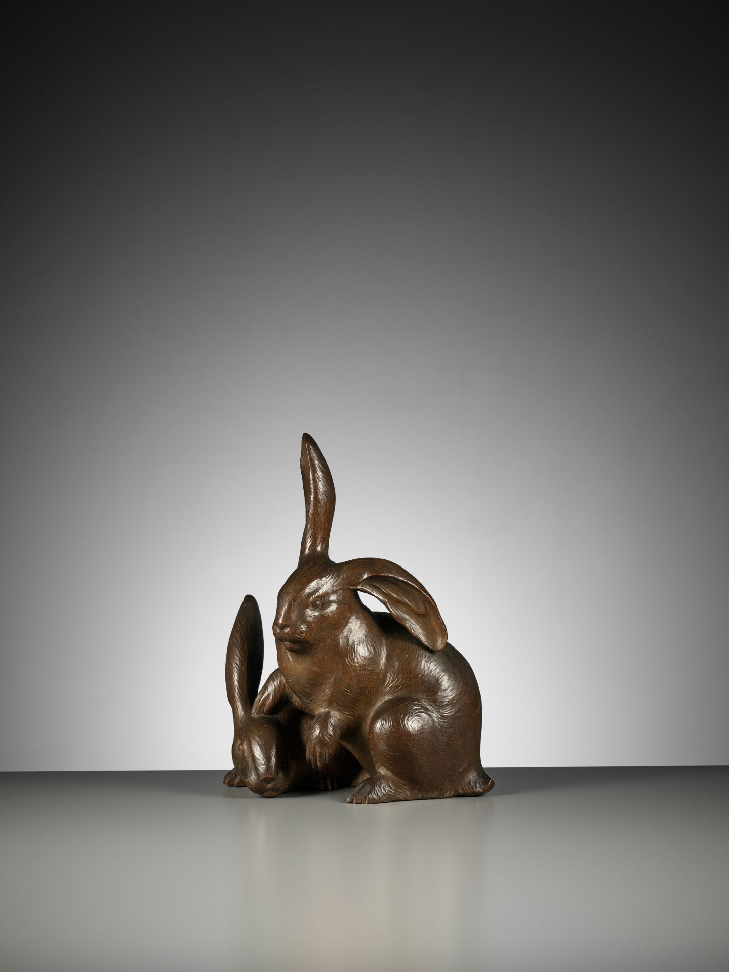 HIROYUKI: A FINE BOXWOOD OKIMONO OF LONG-EARED HARES - Image 4 of 13