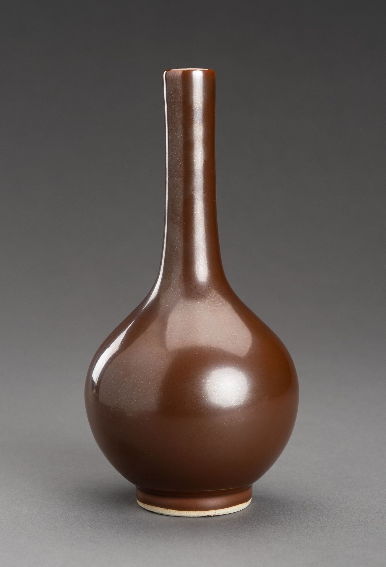 A PERSIMMON GLAZED PORCELAIN VASE, DAN PING