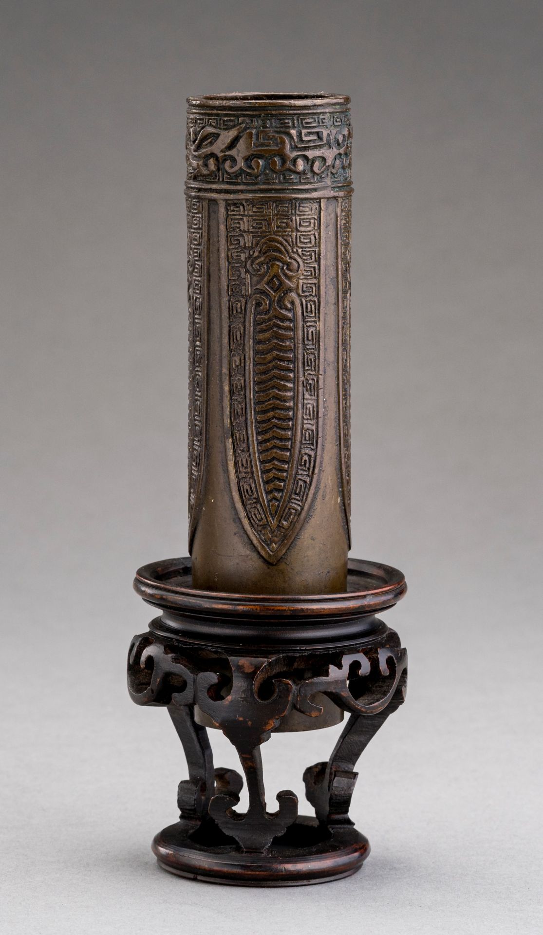 A BRONZE CYLINDRICAL VESSEL WITH CICADAS