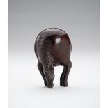 A LARGE WOOD NETSUKE OF A STANDING HORSE
