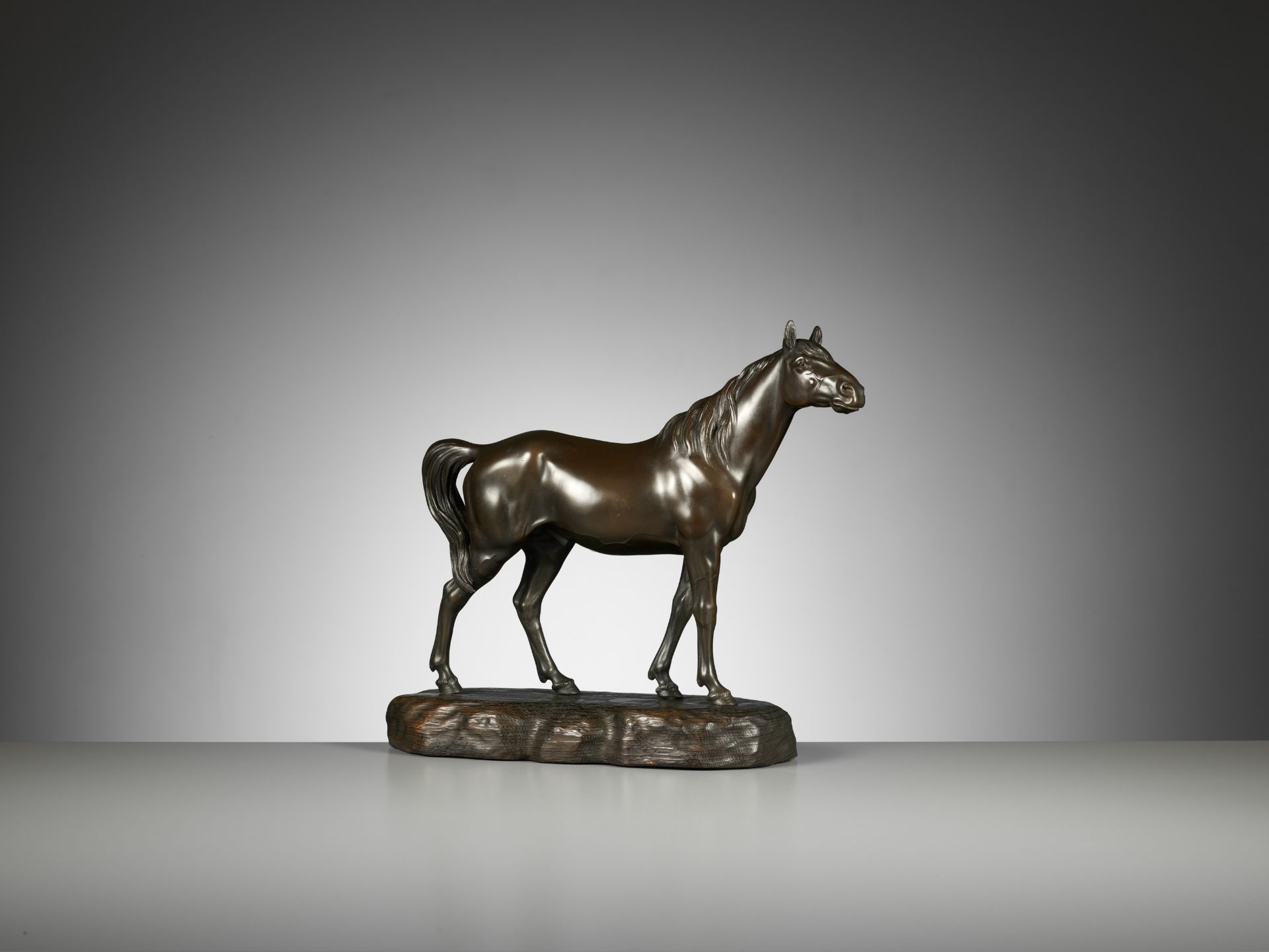 ATSUYOSHI FOR THE MARUKI COMPANY: A MASTERFUL PORTRAIT BRONZE OKIMONO OF A STRIDING HORSE - Image 2 of 11