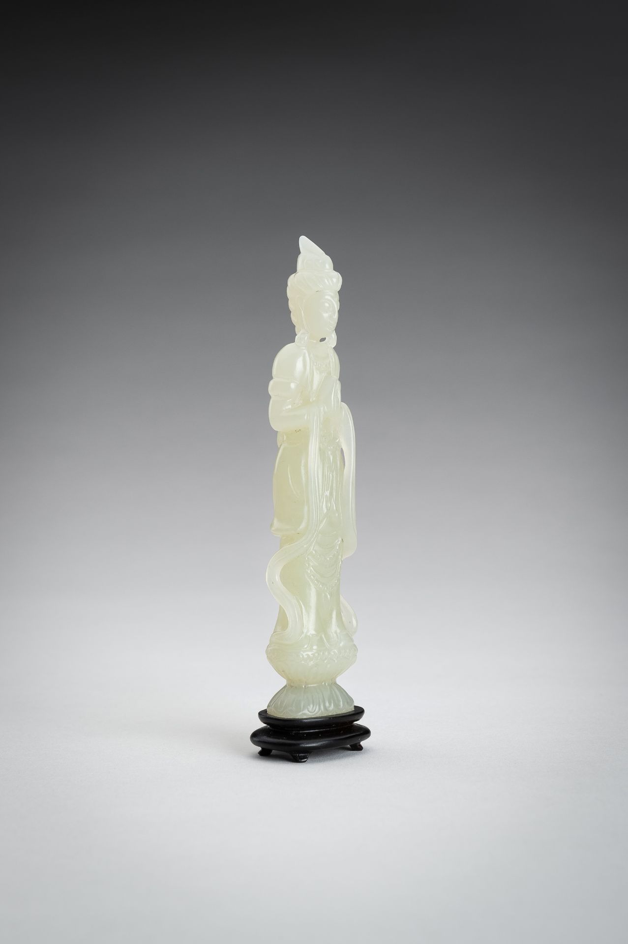 A PALE CELADON JADE CARVING OF A GUANYIN, 1900s - Image 3 of 11