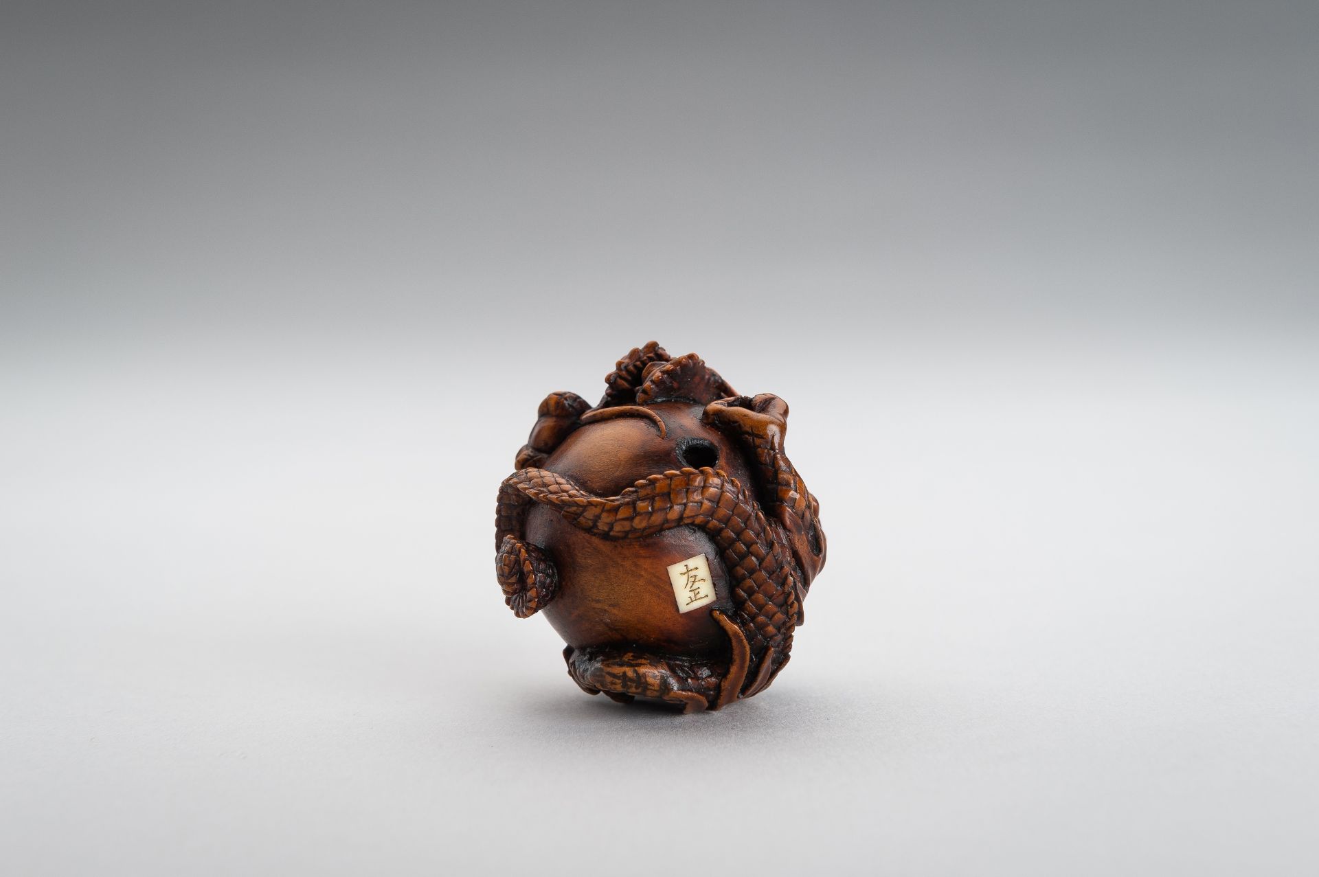 TOMOMASA: A BOXWOOD NETSUKE OF A COILED DRAGON - Image 14 of 15