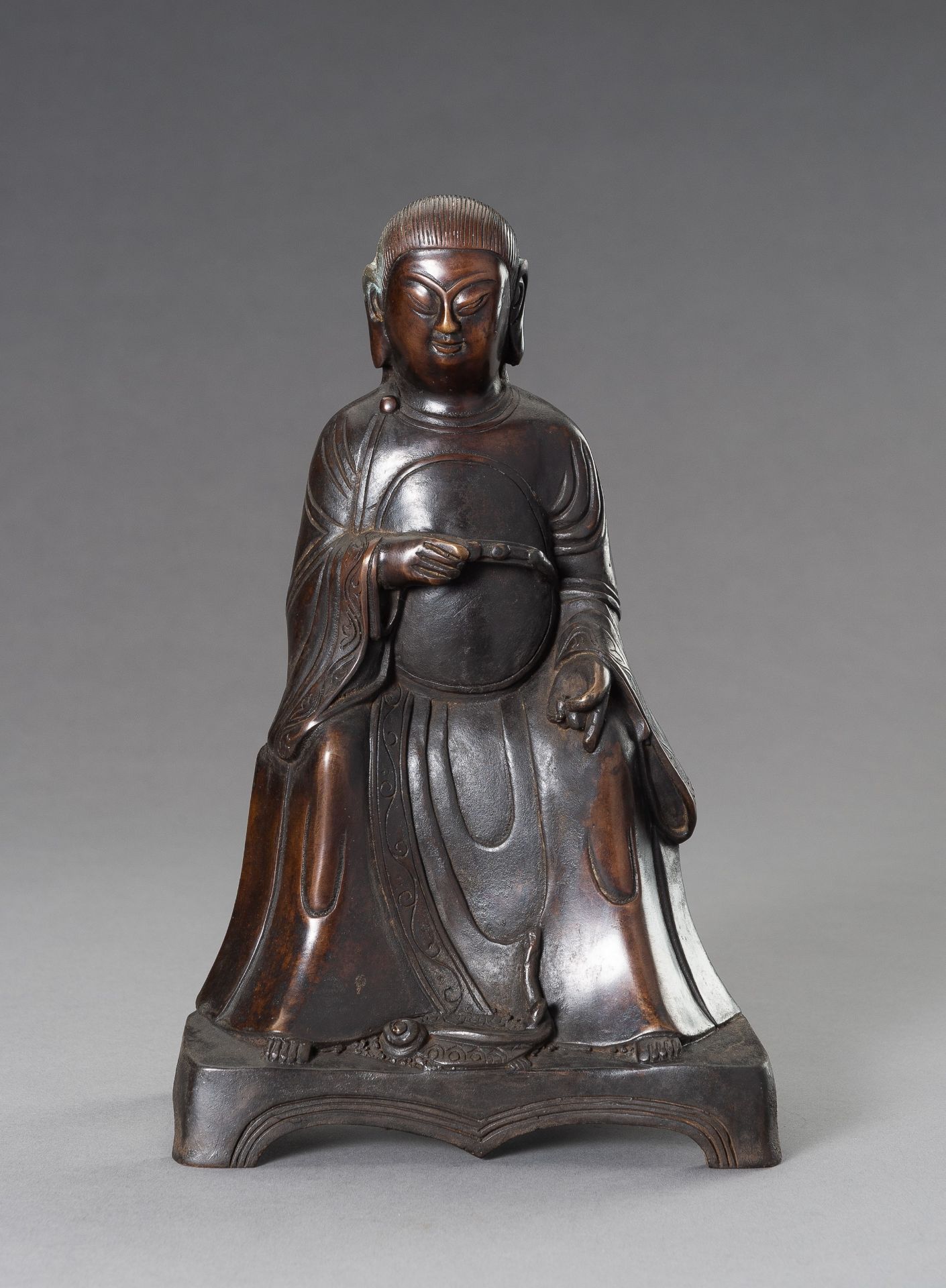 A MING-STYLE BRONZE FIGURE OF ZHENWU