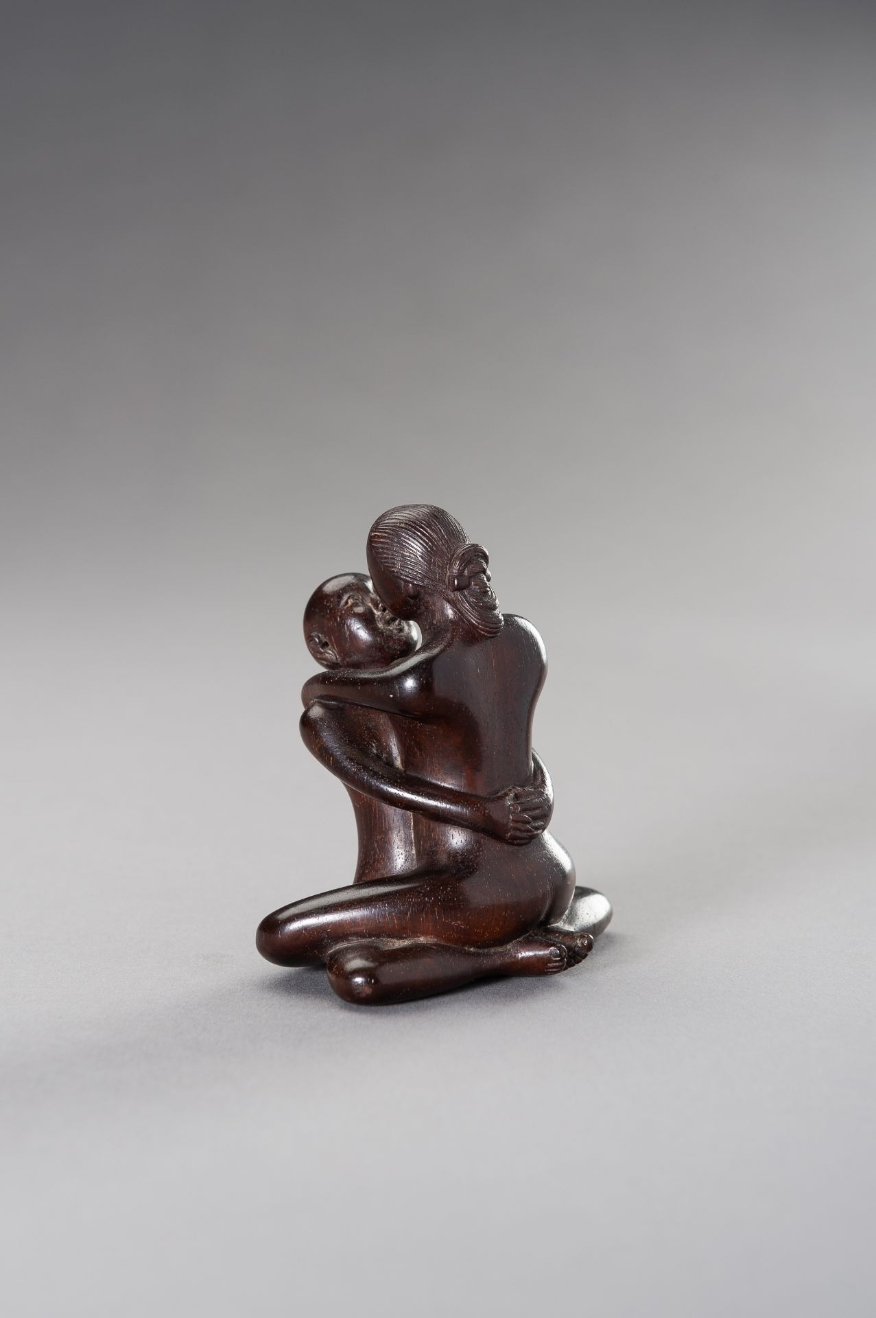 A ZITAN WOOD FIGURE OF A COUPLE IN EROTIC EMBRACE - Image 7 of 12