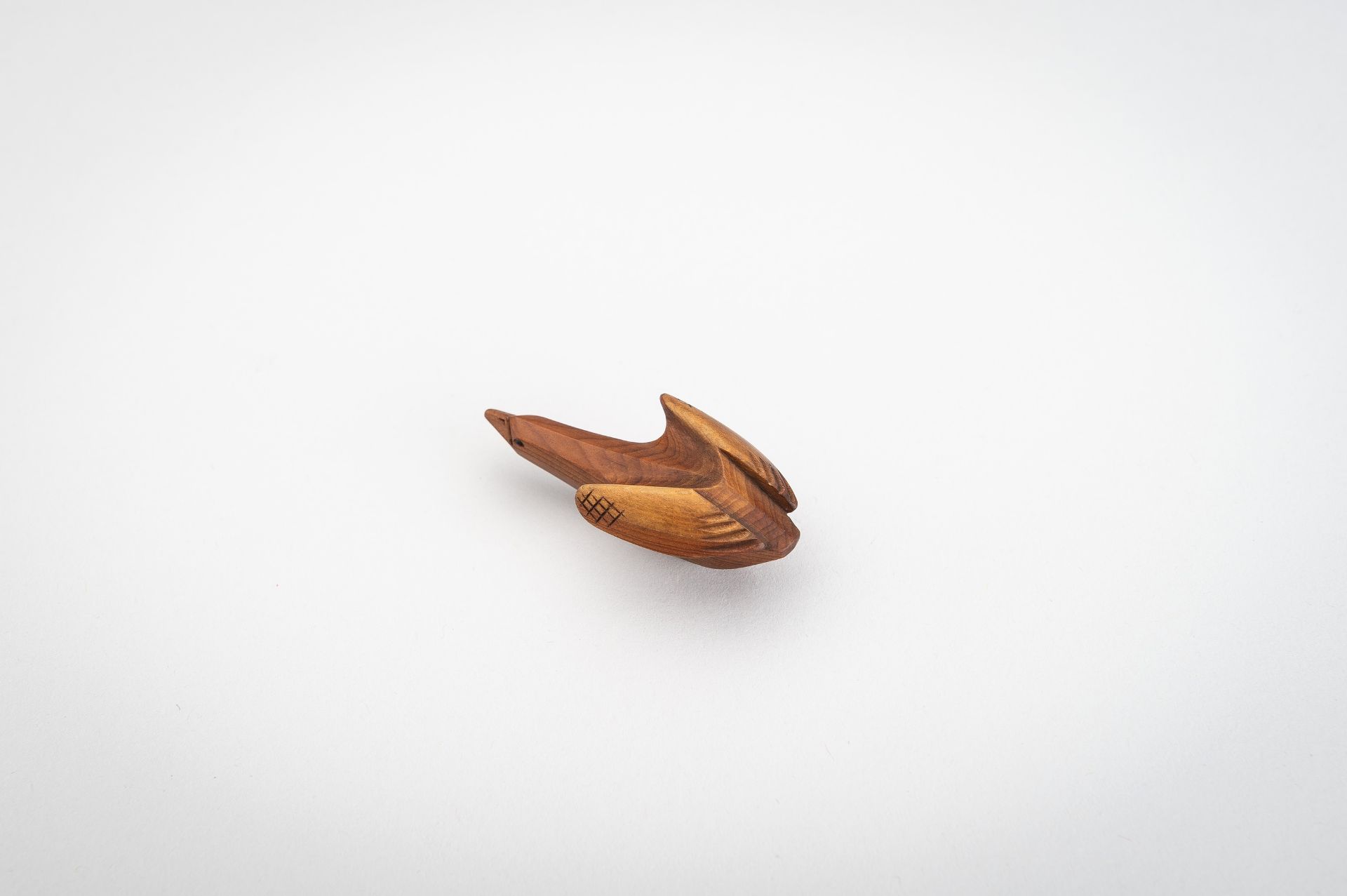 SUKETOMO: A HIDA SCHOOL ITTOBORI WOOD NETSUKE OF A BIRD - Image 7 of 11