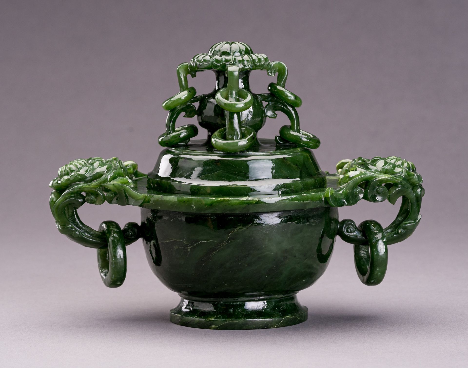 A SPINACH GREEN JADE VESSEL AND COVER