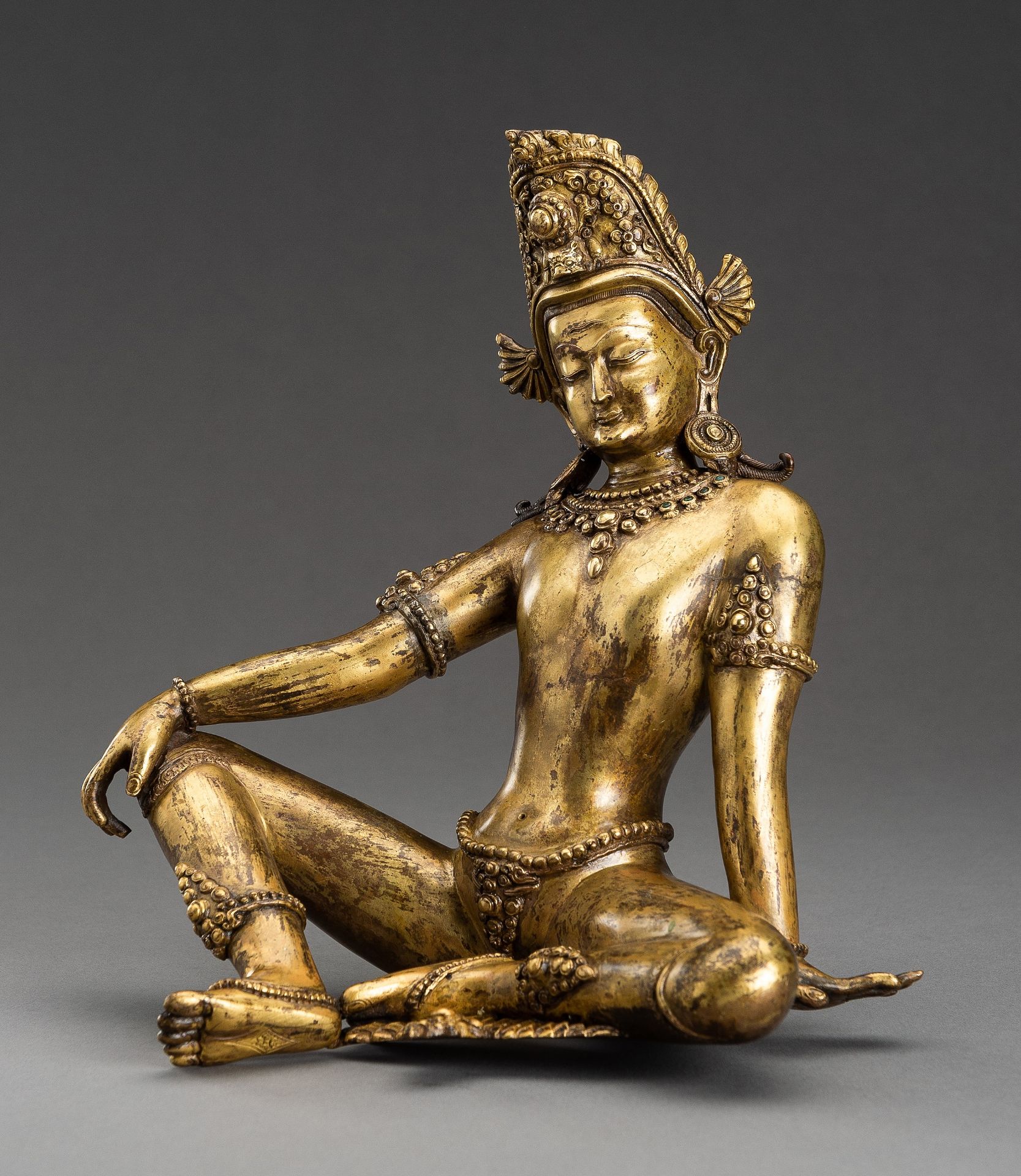 A GILT NEPALI BRONZE FIGURE OF INDRA, 1900s