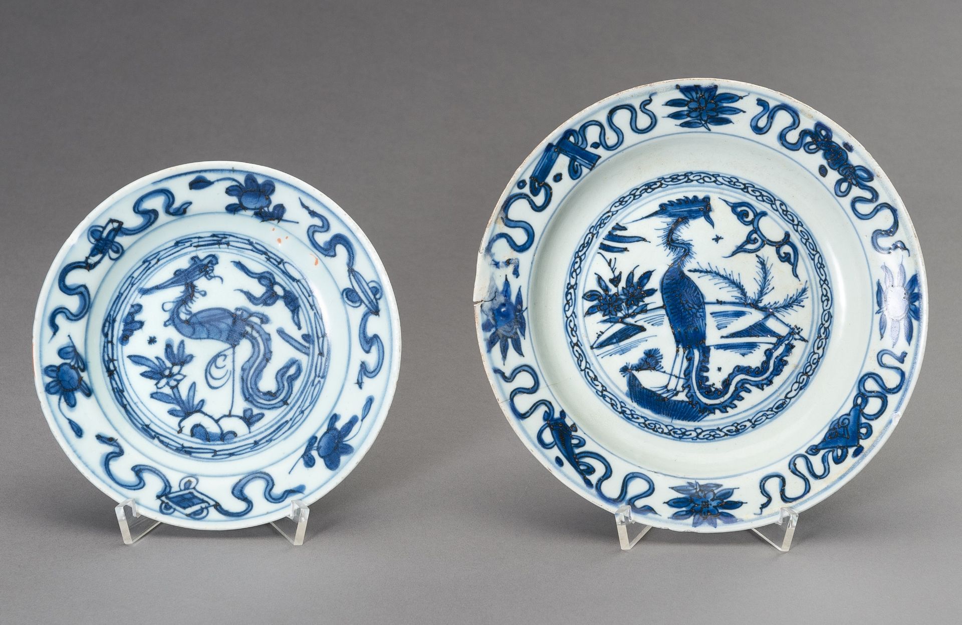 TWO BLUE AND WHITE 'PHOENIX' DISHES, LATE MING