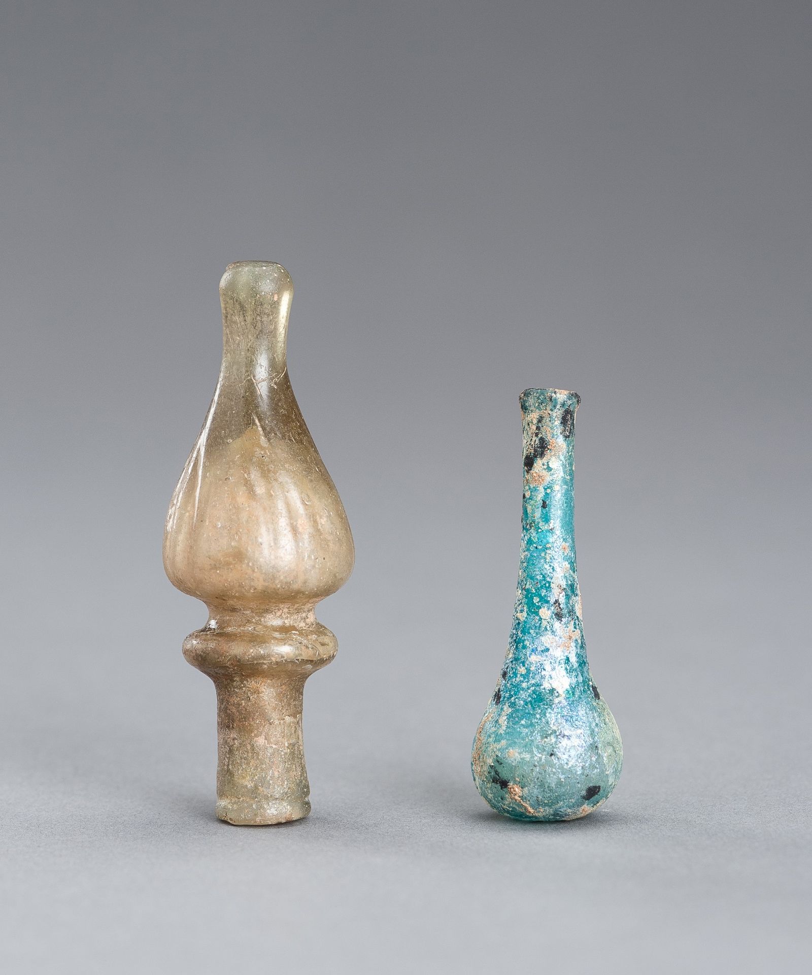 A GLASS STOPPER AND MINIATURE VASE