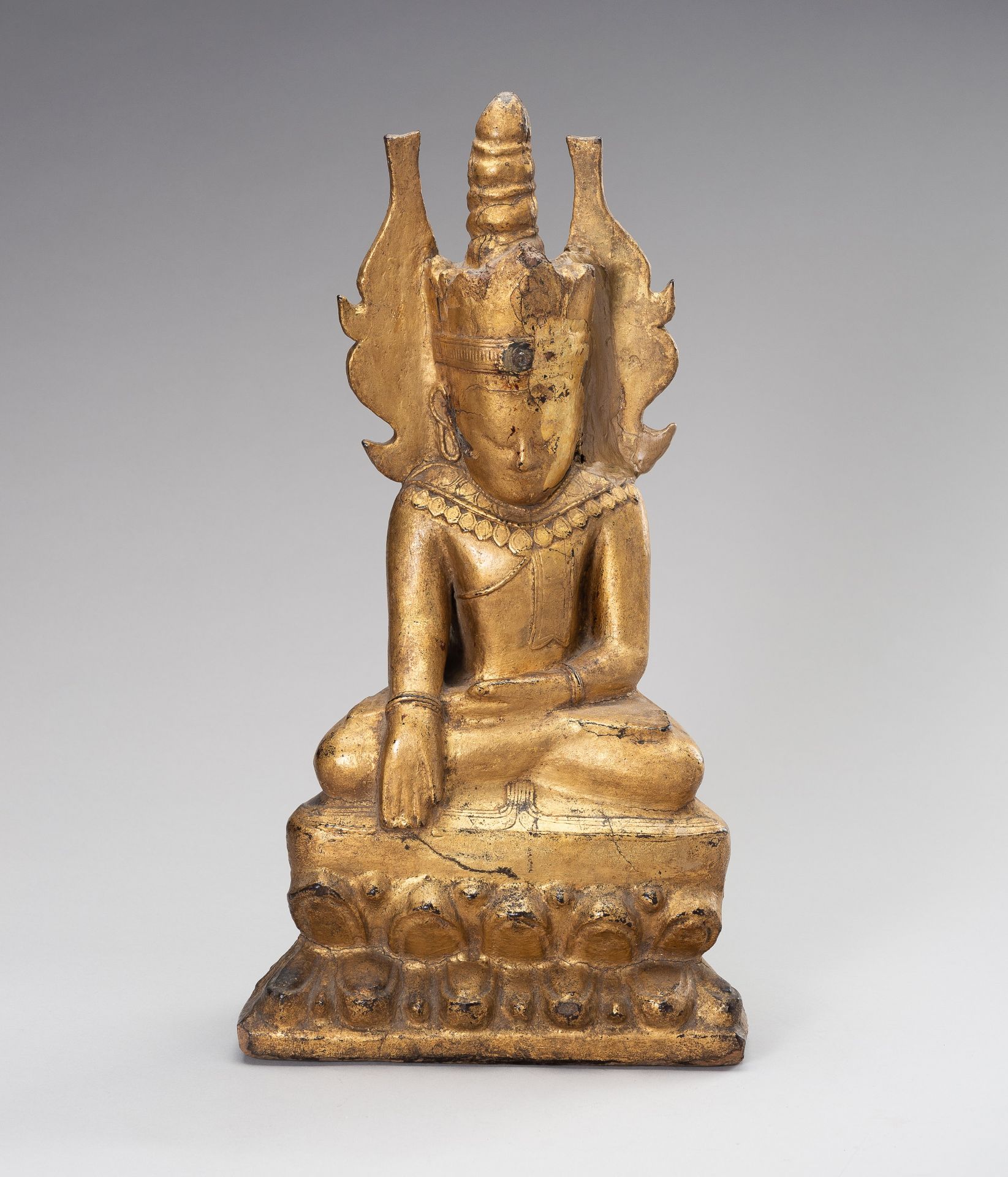 A GOLD LACQUERED WOOD FIGURE OF BUDDHA