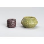 AN ARCHAISTIC LOT WITH TWO LARGE HARDSTONE BEADS