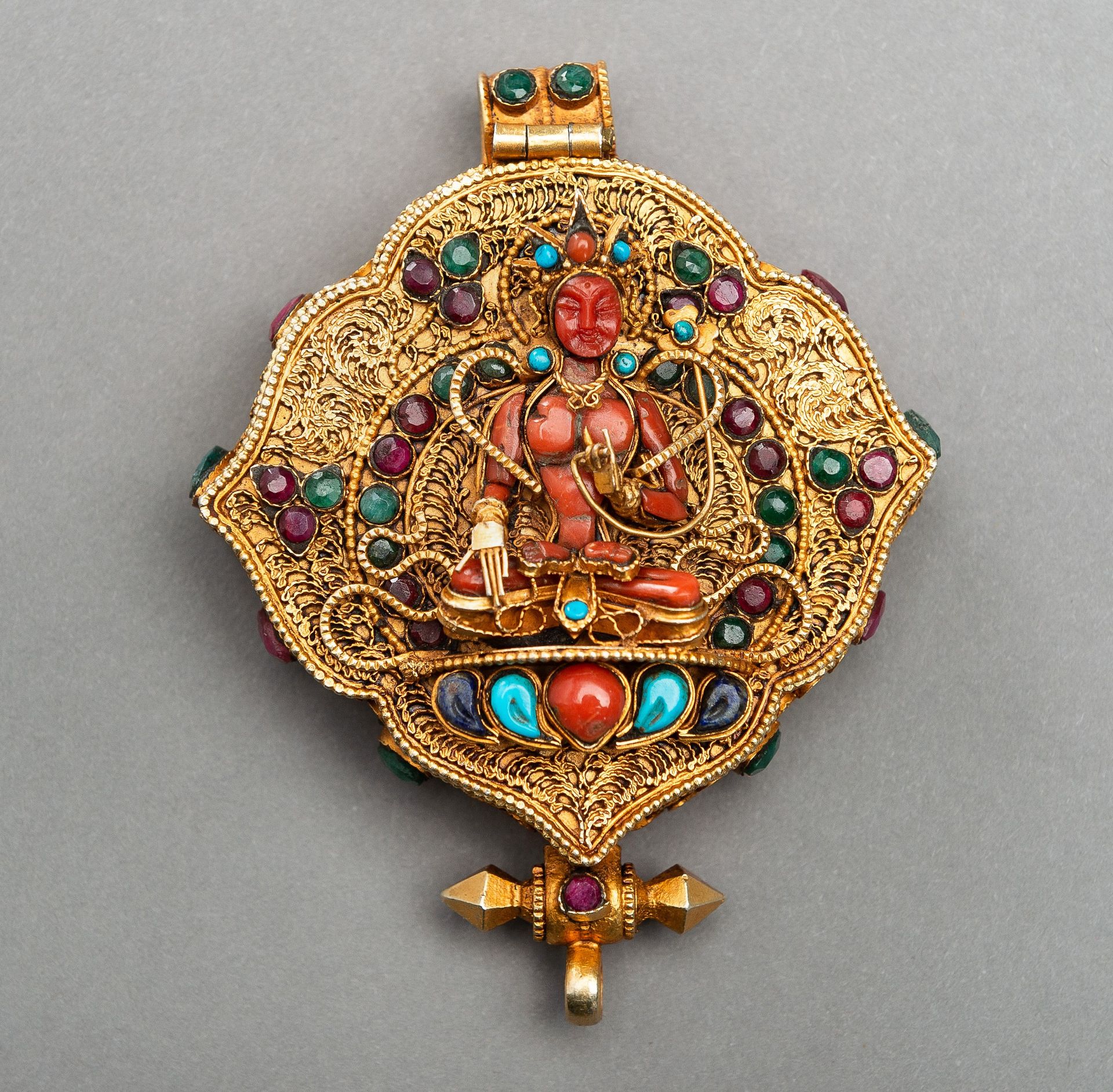 AN INLAID AND GILT AMULET-CONTAINER GAU WITH VAJRASATTVA