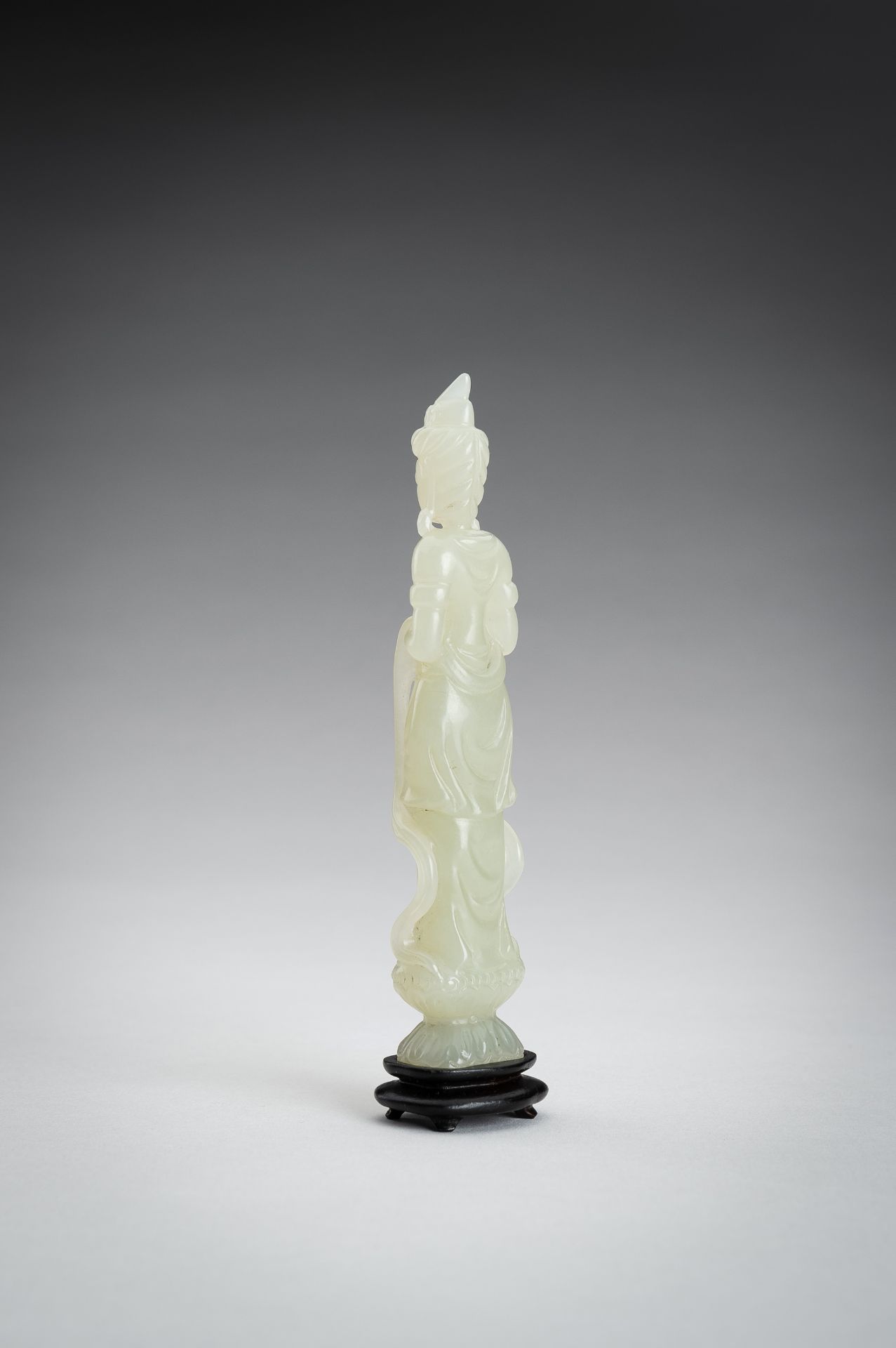 A PALE CELADON JADE CARVING OF A GUANYIN, 1900s - Image 7 of 11