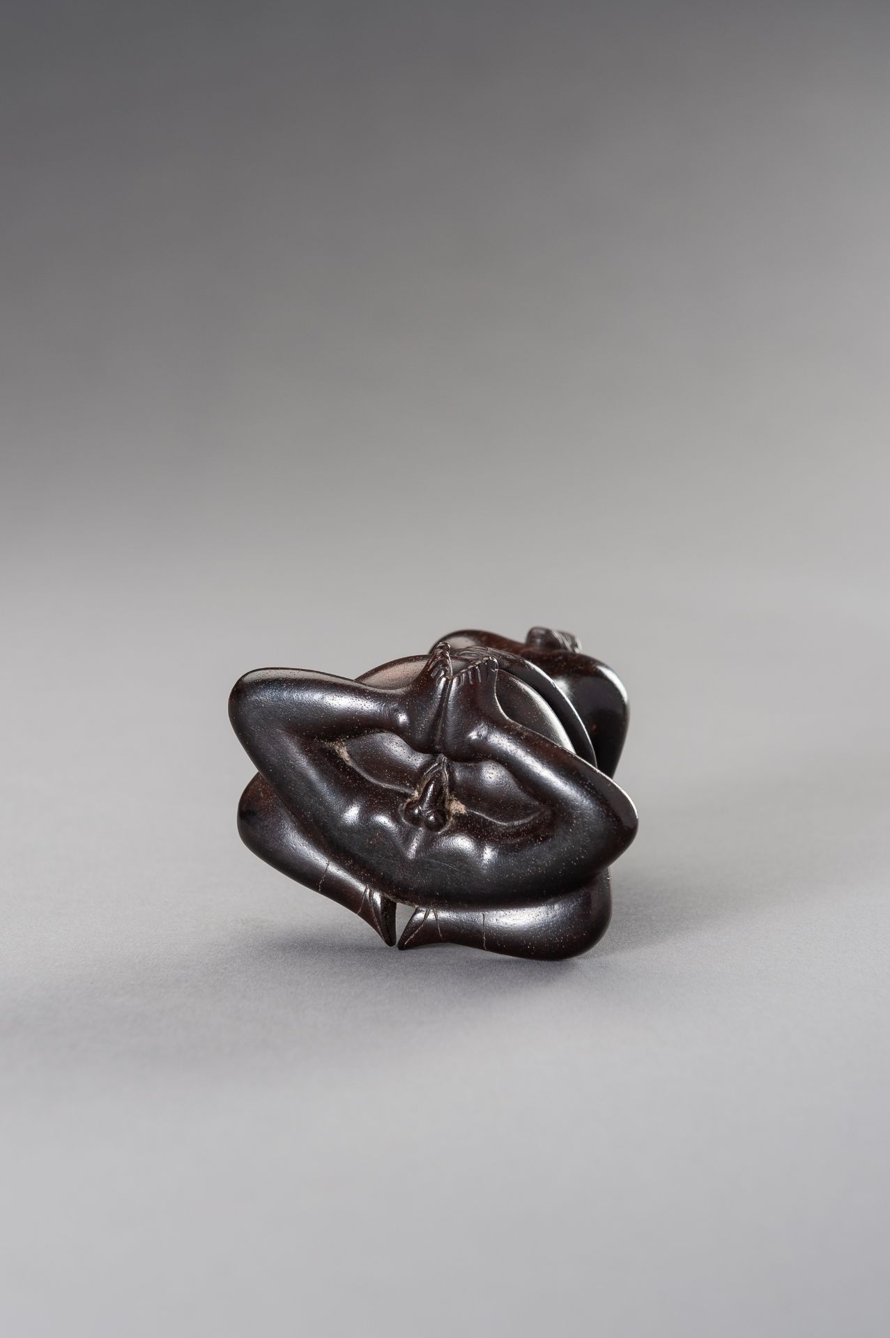 A ZITAN WOOD FIGURE OF A COUPLE IN EROTIC EMBRACE - Image 11 of 12