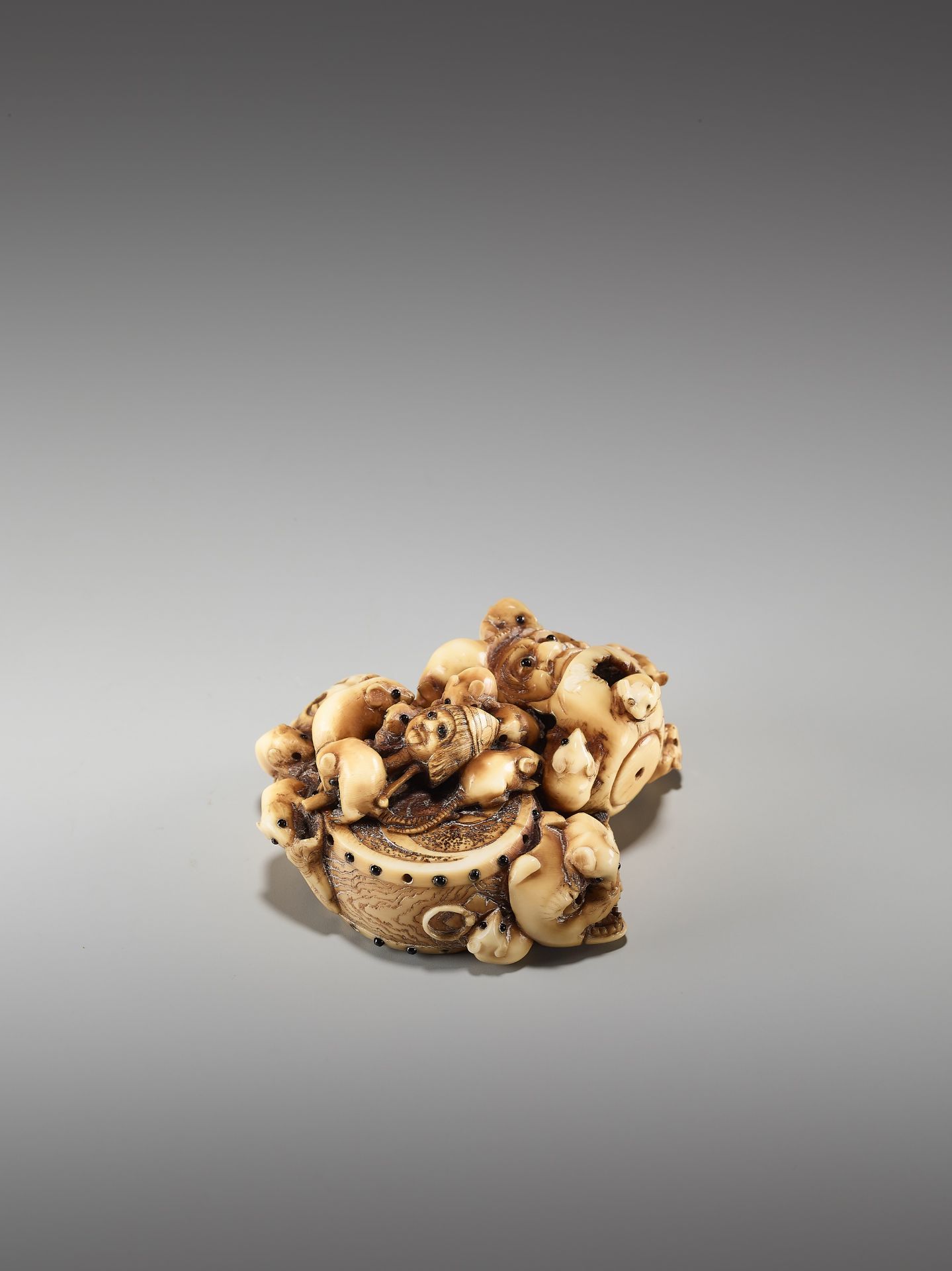 A CHARMING AND RARE IVORY NETSUKE OF A BUNDLE OF RATS WITH DARUMA DOLLS AND MASKS BY MASAMITSU - Image 7 of 10